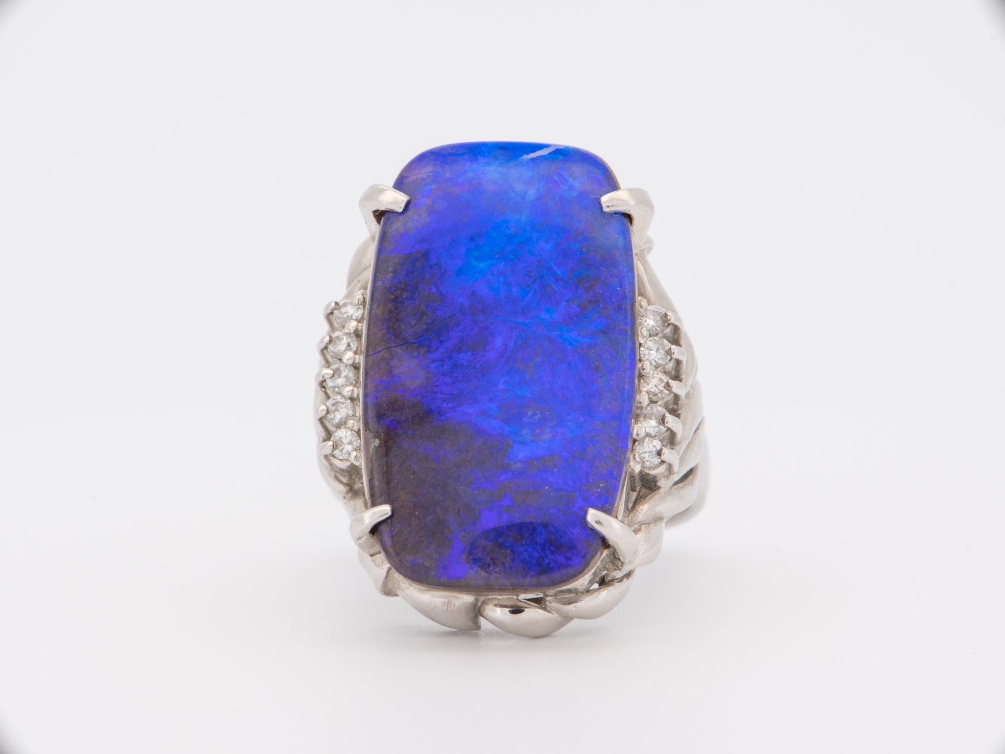 ♥ Rich Purple Blue Australian Boulder Opal Ring Platinum
♥ The face of the ring measures 18.9mm in width (East West direction), 25.5mm in length (North South direction), and sits 8mm tall from the finger. The band is 2.6mm wide.

♥ US size 6.5 (Free