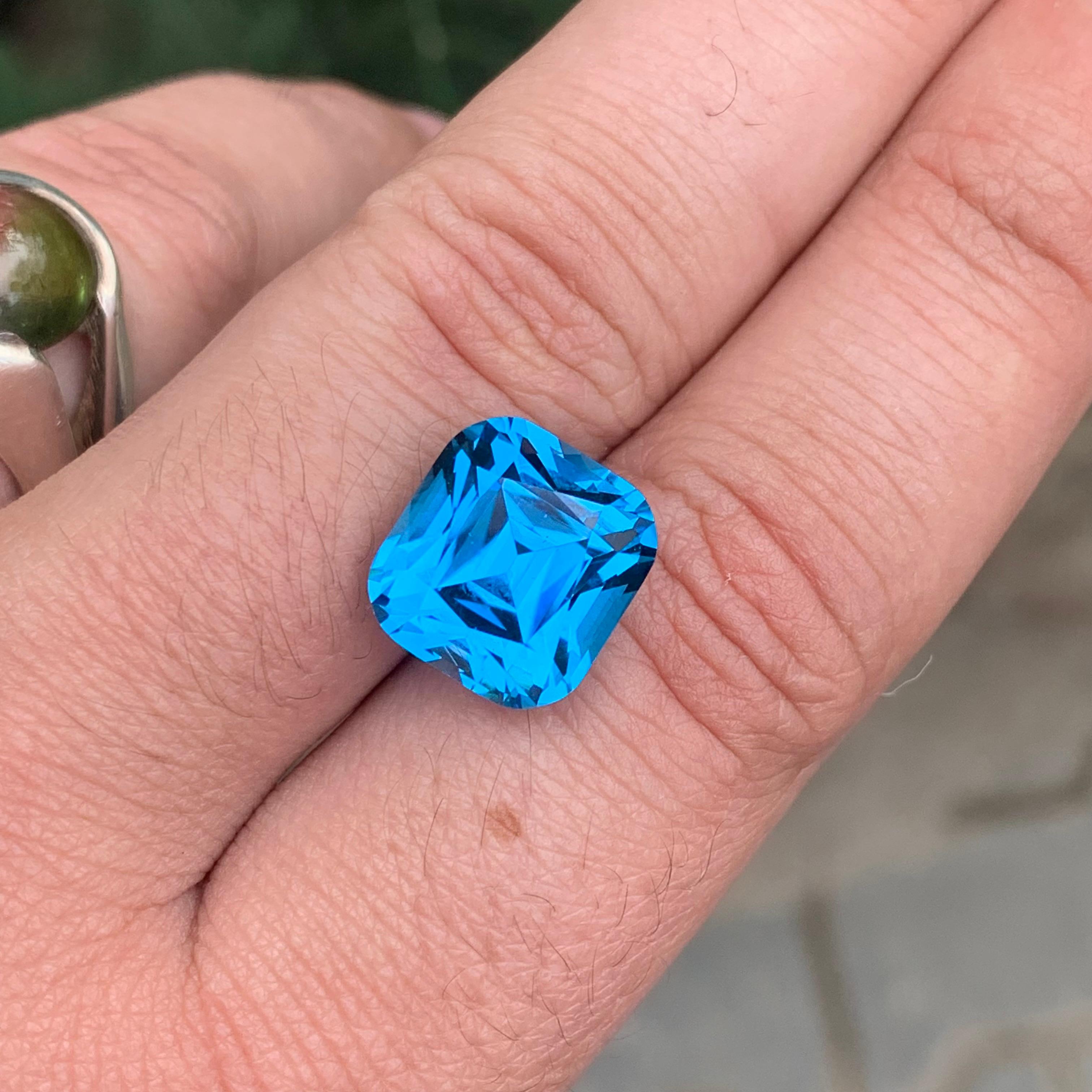 Women's or Men's 15.45 Carat Gorgeous Faceted Swiss Blue Topaz Cushion Shape Gemstone For Sale