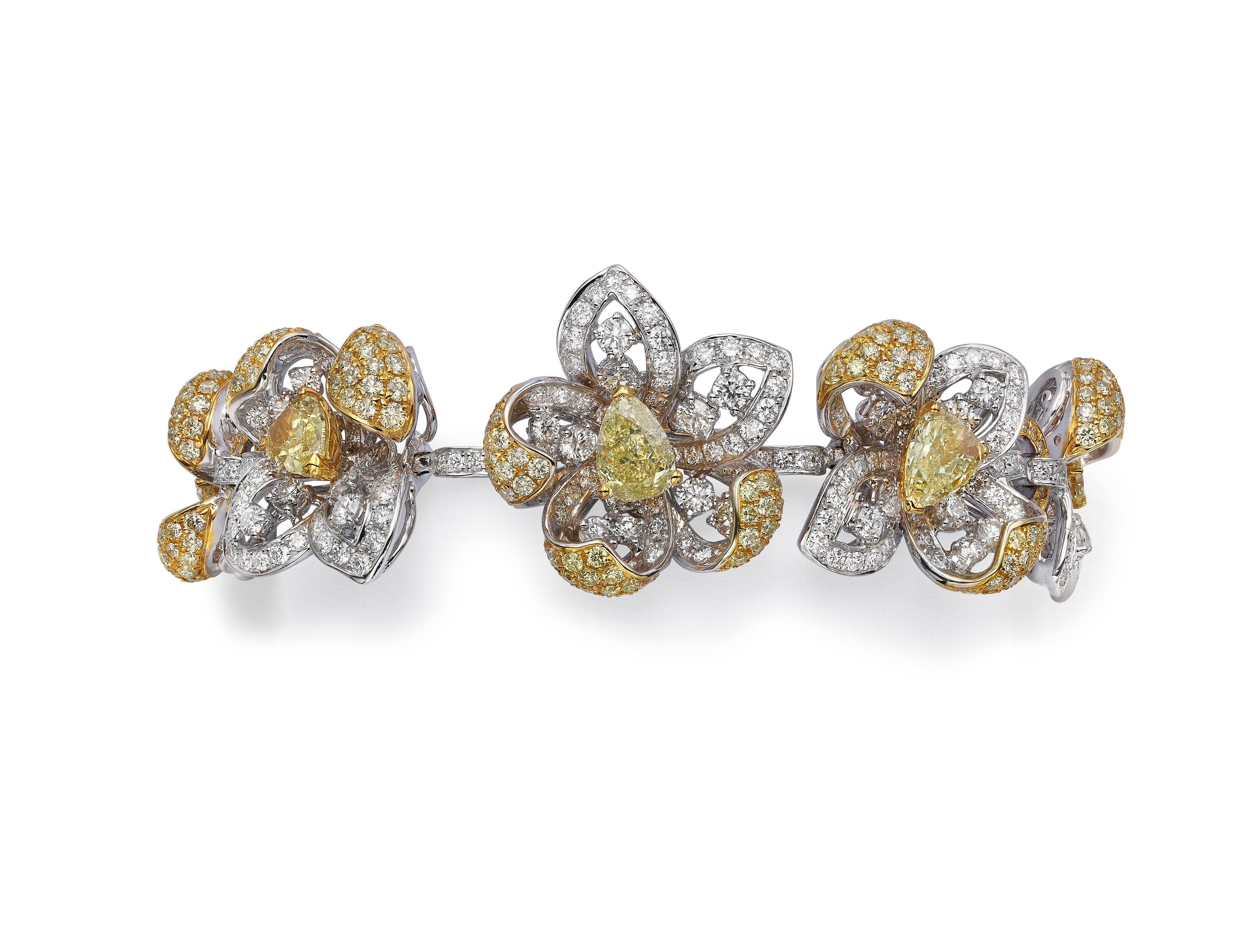 Butani's bracelet is handmade from 18K yellow and white gold and inlaid with seven faceted pear-shape yellow diamonds (totaling 4.32 carats) and pave encrusted with brilliant-cut white and yellow diamonds (totaling 11.13 carats) in a floral motif. 