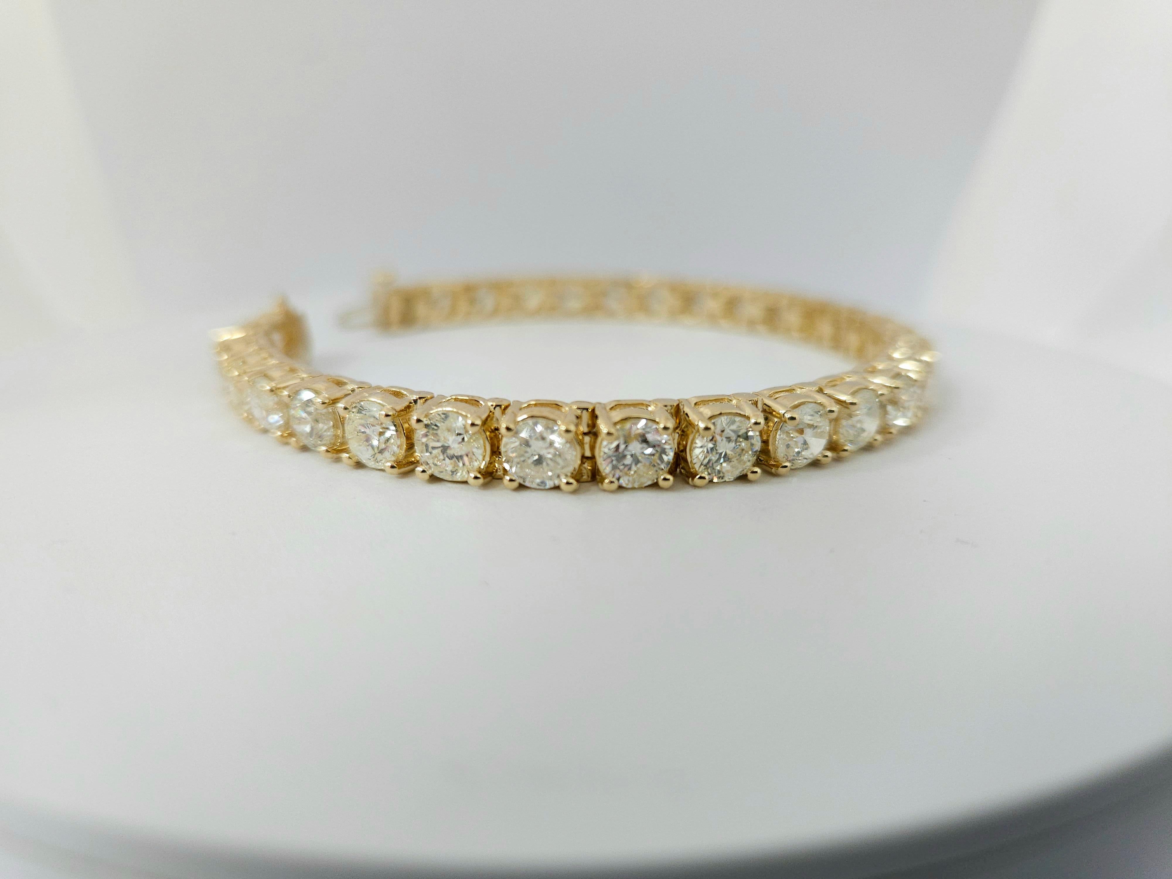 Natural diamonds tennis bracelet round-brilliant cut  14k yellow gold. 
7 inch. Average Color I, Clarity SI, 5.60 mm wide,30 pcs, 22.75 grams very shiny don't miss.

*Free shipping within U.S*

