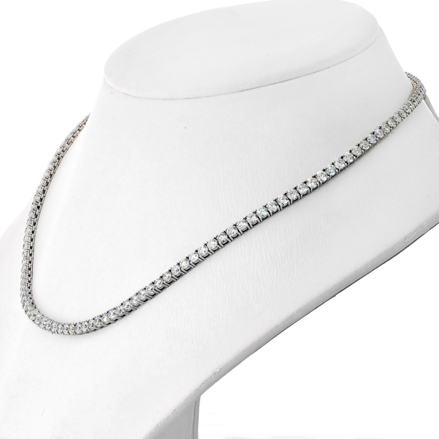 Introducing the epitome of elegance: the 15.45cttw Round Cut Diamond Riviera Necklace in 14K White Gold. This breathtaking piece is a true masterpiece, meticulously crafted to showcase the timeless beauty of round-cut diamonds. With a total carat