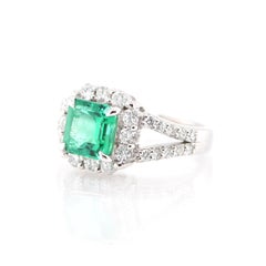 1.546 Carat Natural Emerald and Diamond Ring Set in Platinum