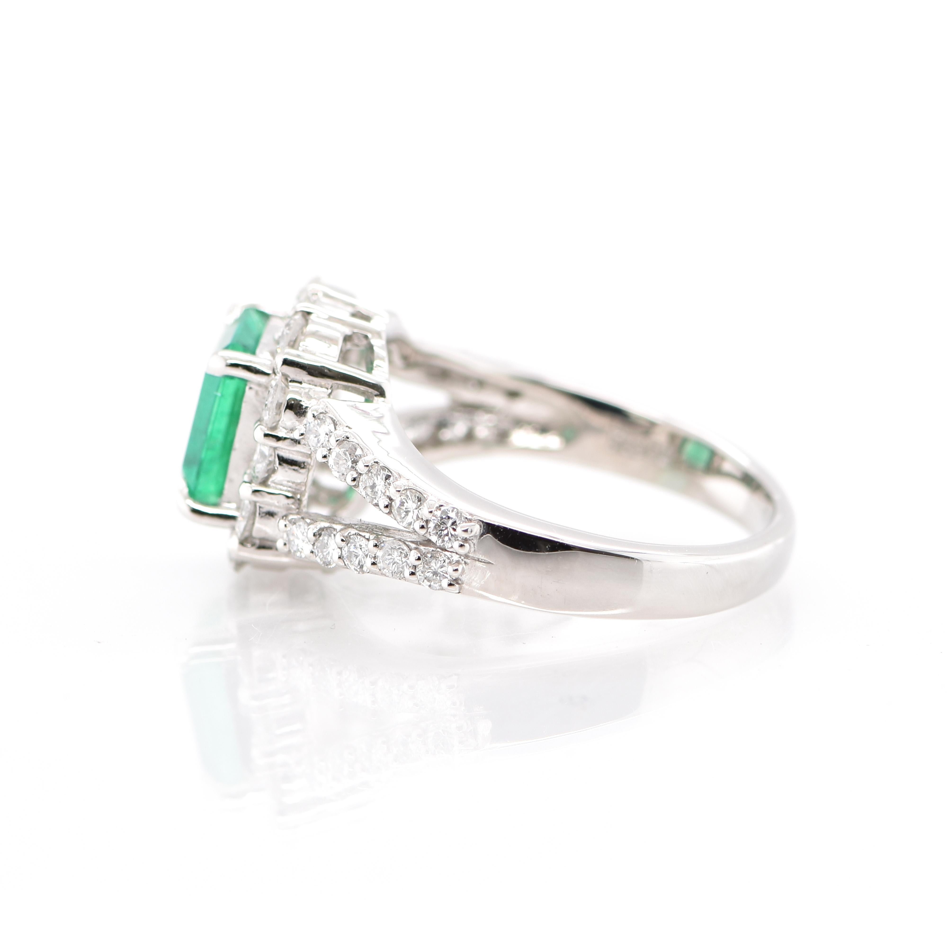 Emerald Cut 1.546 Carat Natural Emerald and Diamond Ring Set in Platinum