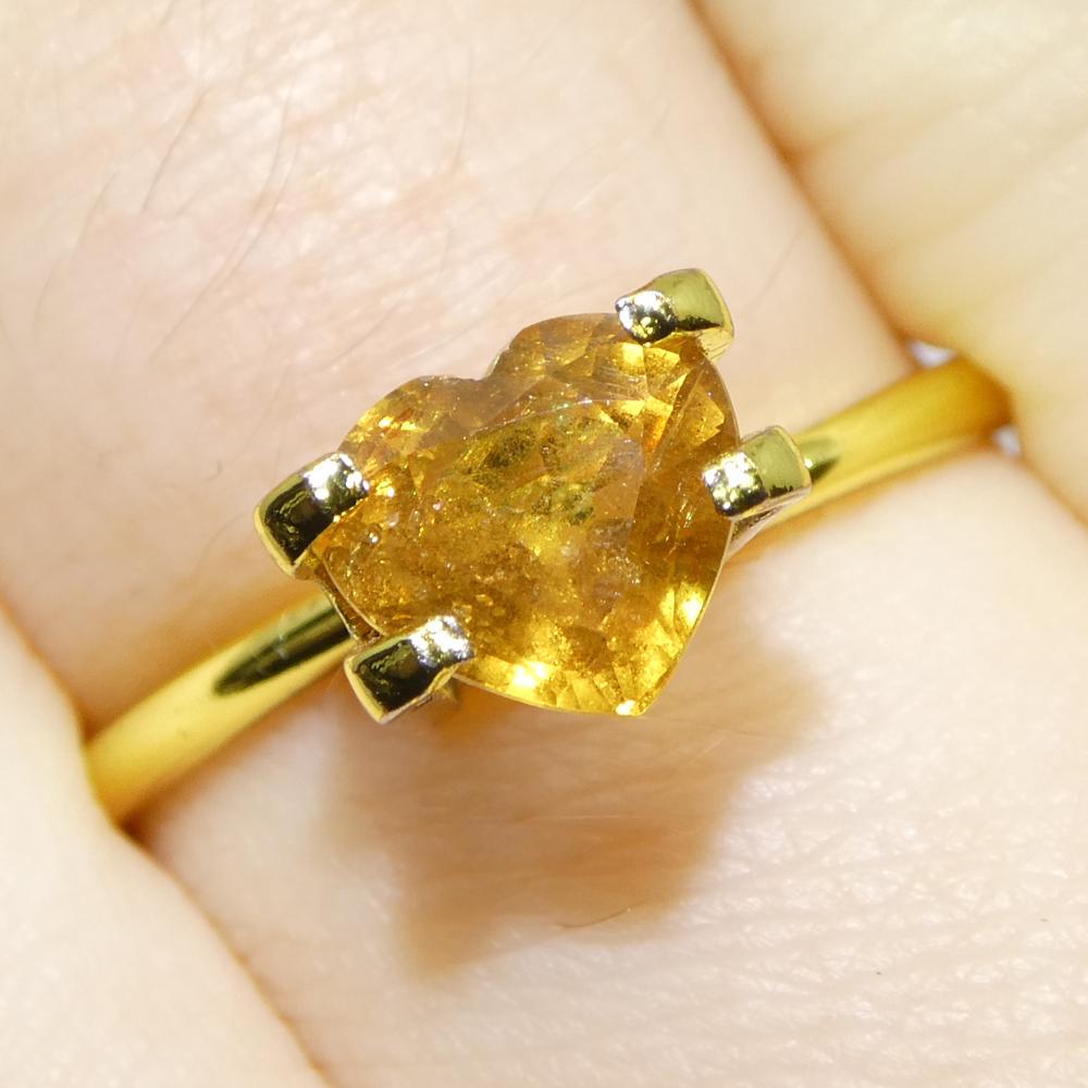 Description:

Gem Type: Sapphire 
Number of Stones: 1
Weight: 1.54 cts
Measurements: 7.00 x 6.46 x 4.10 mm
Shape: Heart
Cutting Style Crown: Brilliant Cut
Cutting Style Pavilion: Step Cut 
Transparency: Transparent
Clarity: Moderately Included: