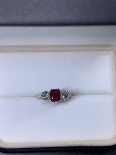 1.54ct Ruby and diamonds trilogy engagement ring in platinum.