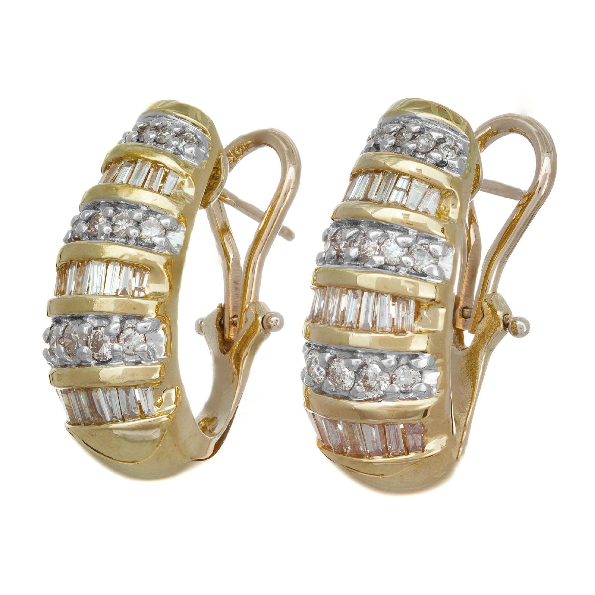 Clip post hoop earrings with 1.55 carats of baguette and round diamonds in 14k yellow gold 

30 round brilliant cut diamonds I-J SI-I, approx. .45cts
46 tapered baguette diamonds I-J SI-I, approx. 1.10cts
14k yellow gold
Stamped: 14k
10 grams
Top to