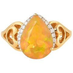 1.55 Carat Ethiopian Opal with Diamond Ring in 18 Karat Yellow Gold