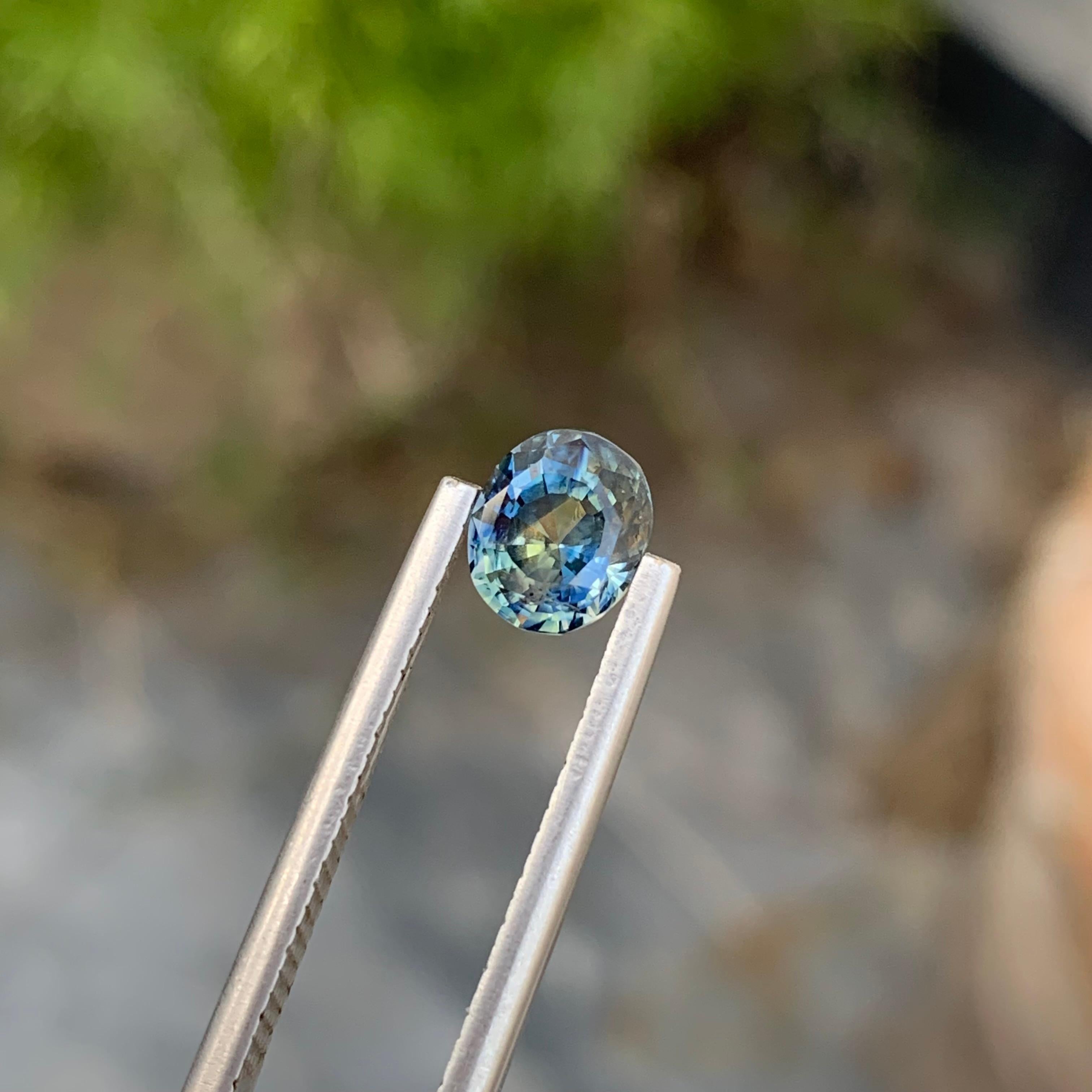 1.55 Carat Faceted Yellowish Blue Sapphire Oval Shape Gem From Madagascar Mine For Sale 3
