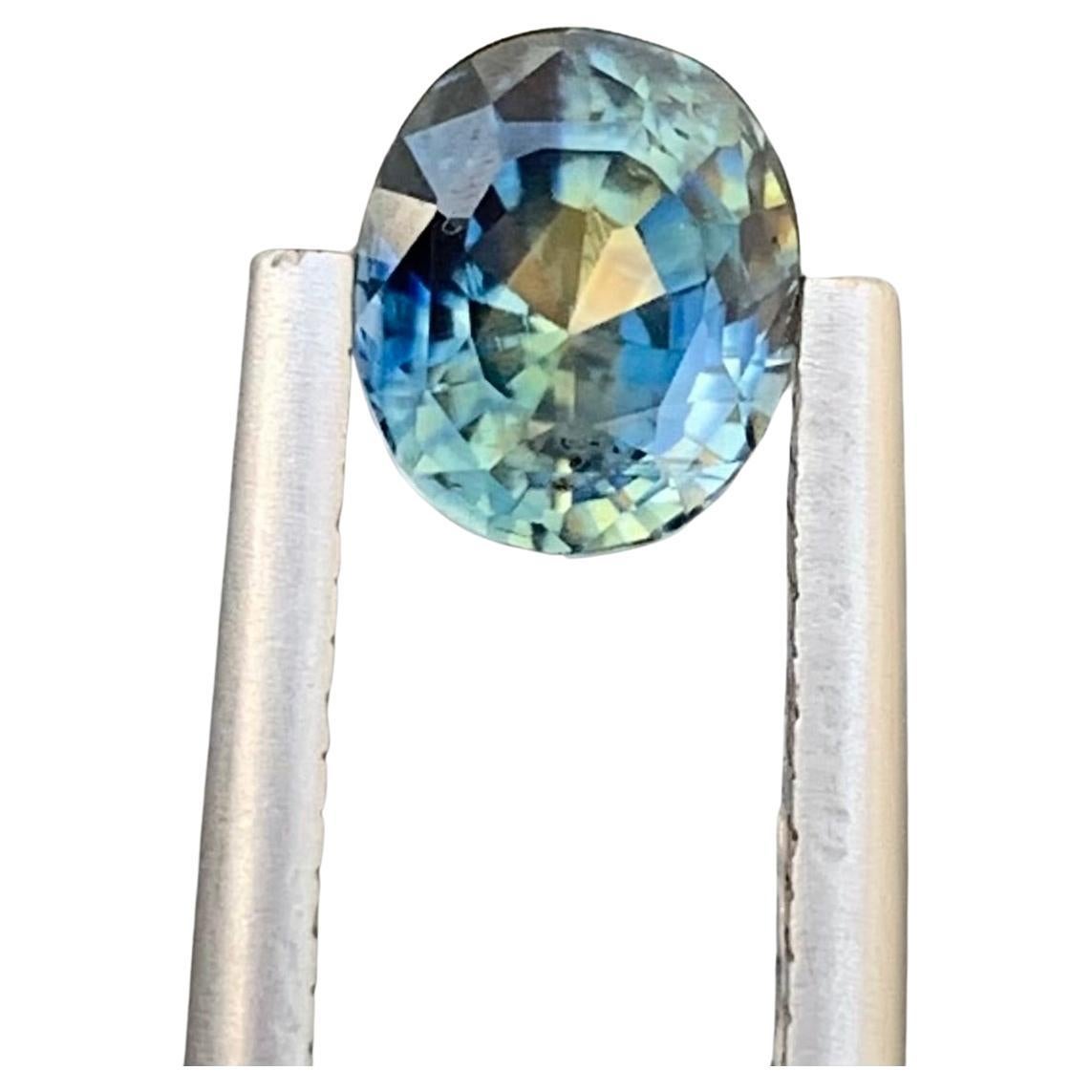 1.55 Carat Faceted Yellowish Blue Sapphire Oval Shape Gem From Madagascar Mine