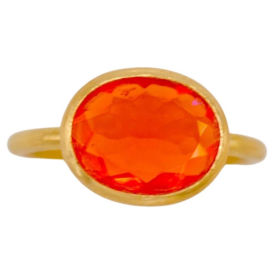 Scrives 1.55 Carat Fire Opal Oval Faceted 22 Karat Gold Handmade Cocktail Ring For Sale