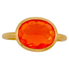 Vintage Scrives 1.55 Carat Fire Opal Oval Faceted 22 Karat Gold Handmade Cocktail Ring