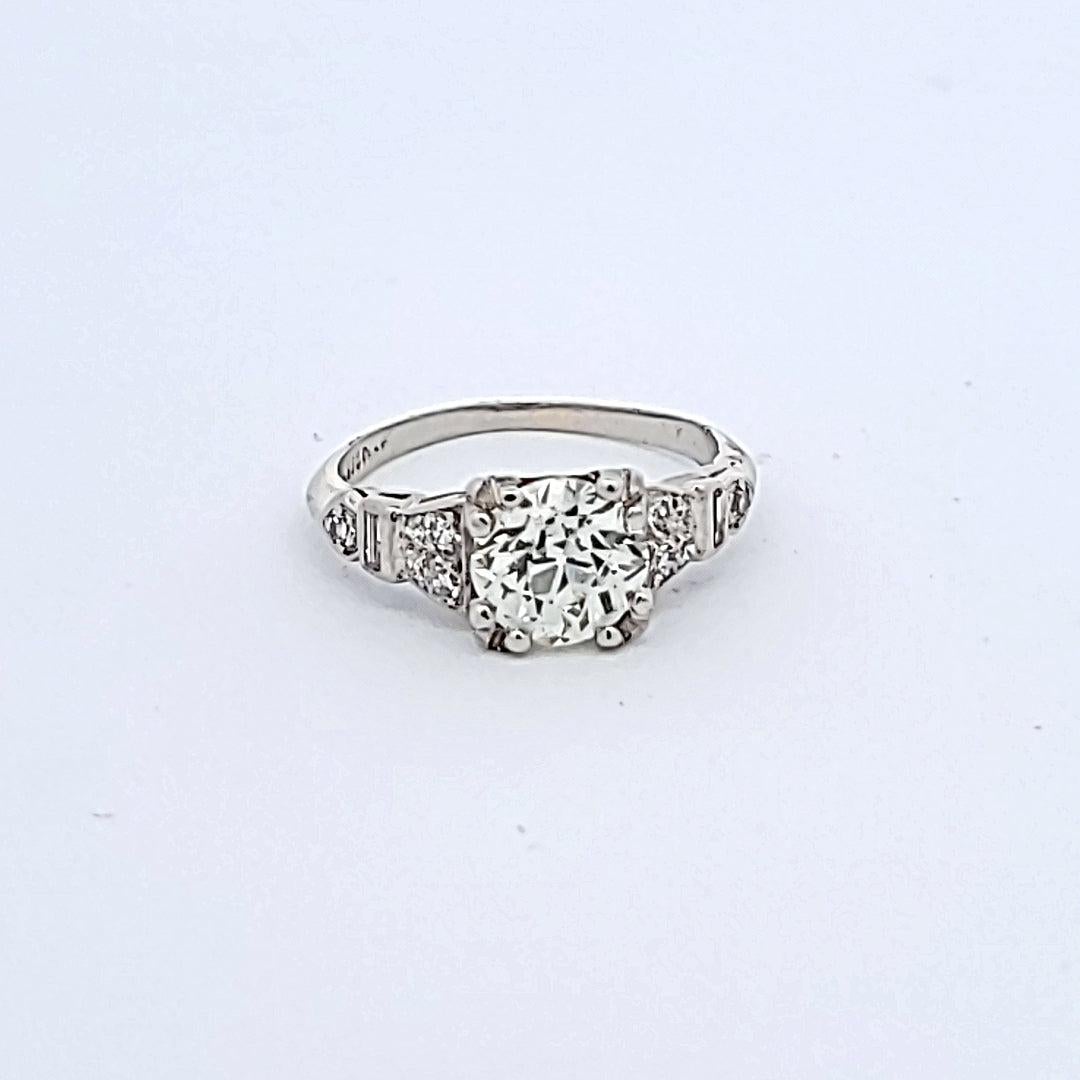 Title:
1.55 Carat Old European Cut M-VS2 Diamond Platinum Art Deco Ring
Style:
Art Deco
Metal:
Platinum
Gemstone 1:
0.15 Carat Diamond
Number of Stones:
12
Gemstone 2:
1.4 Carat Diamond
Number of Stones:
1
Color:
M
Clarity:
VS2
Shape:
Old European