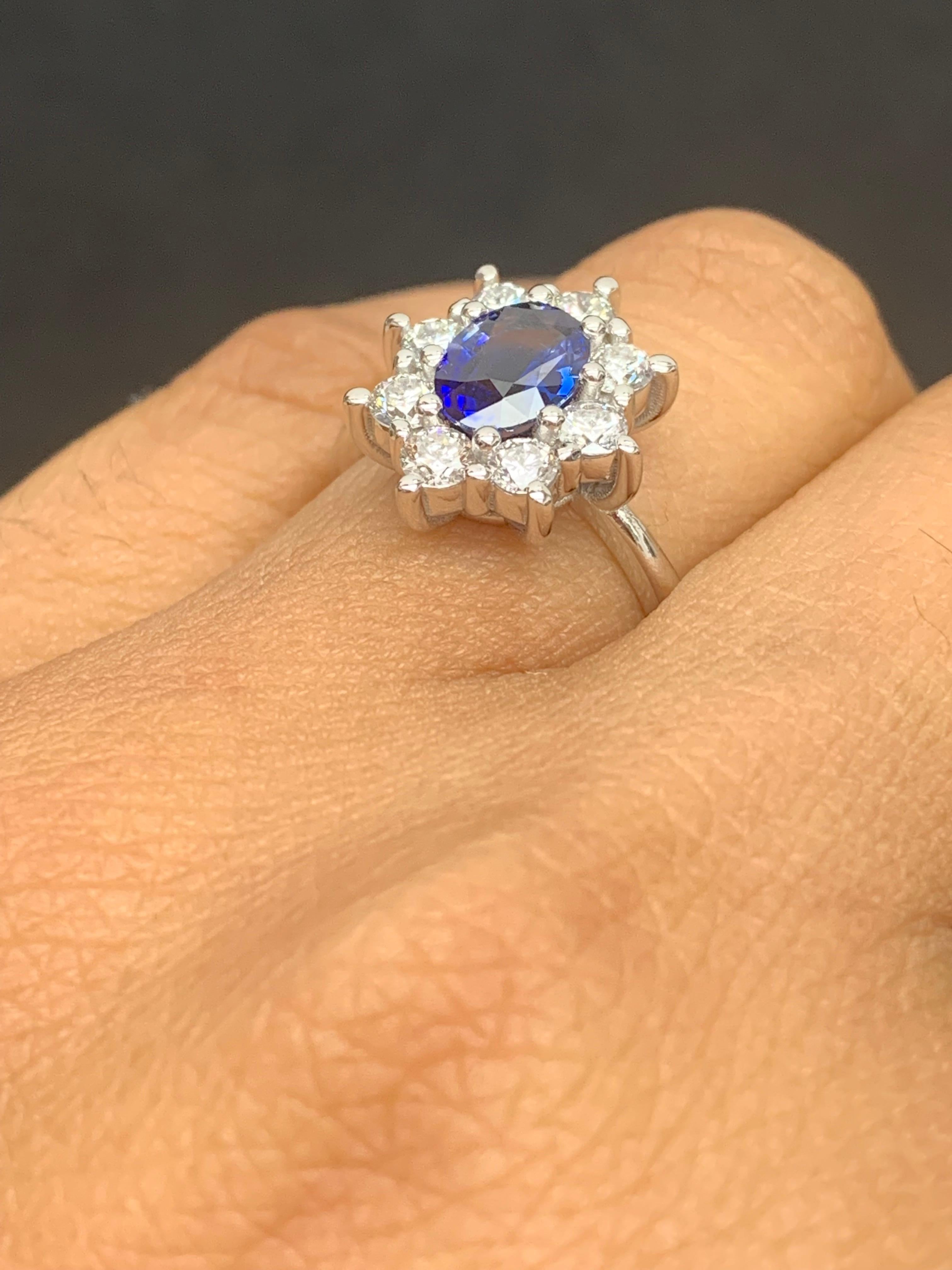 1.55 Carat Oval Cut Blue Sapphire and Diamond Ring in 14k White Gold In New Condition For Sale In NEW YORK, NY