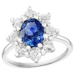 1.55 Carat Oval Cut Blue Sapphire and Diamond Ring in 14k White Gold