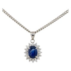 1.55 Carat Oval Sapphire Center with Diamond Halo Pendant Necklace Platinum