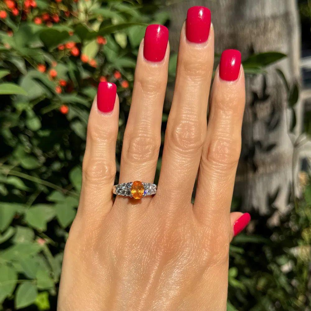 Modernist 1.55 Carat Oval Spessartite Garnet and RBC Diamond Gold Vintage Cocktail Ring For Sale