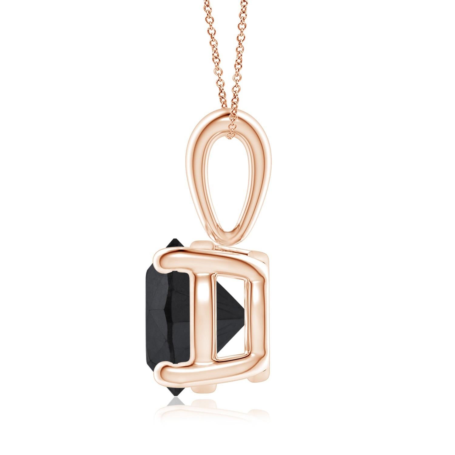 Surprise a special woman in your life with this breathtaking, statement hand crafted solitaire black diamond necklace. This eye-catching pendant necklace features a 1.55 carat round cut black diamond, measuring 6.73 x 6.79 x 4.52 mm set in 14k rose