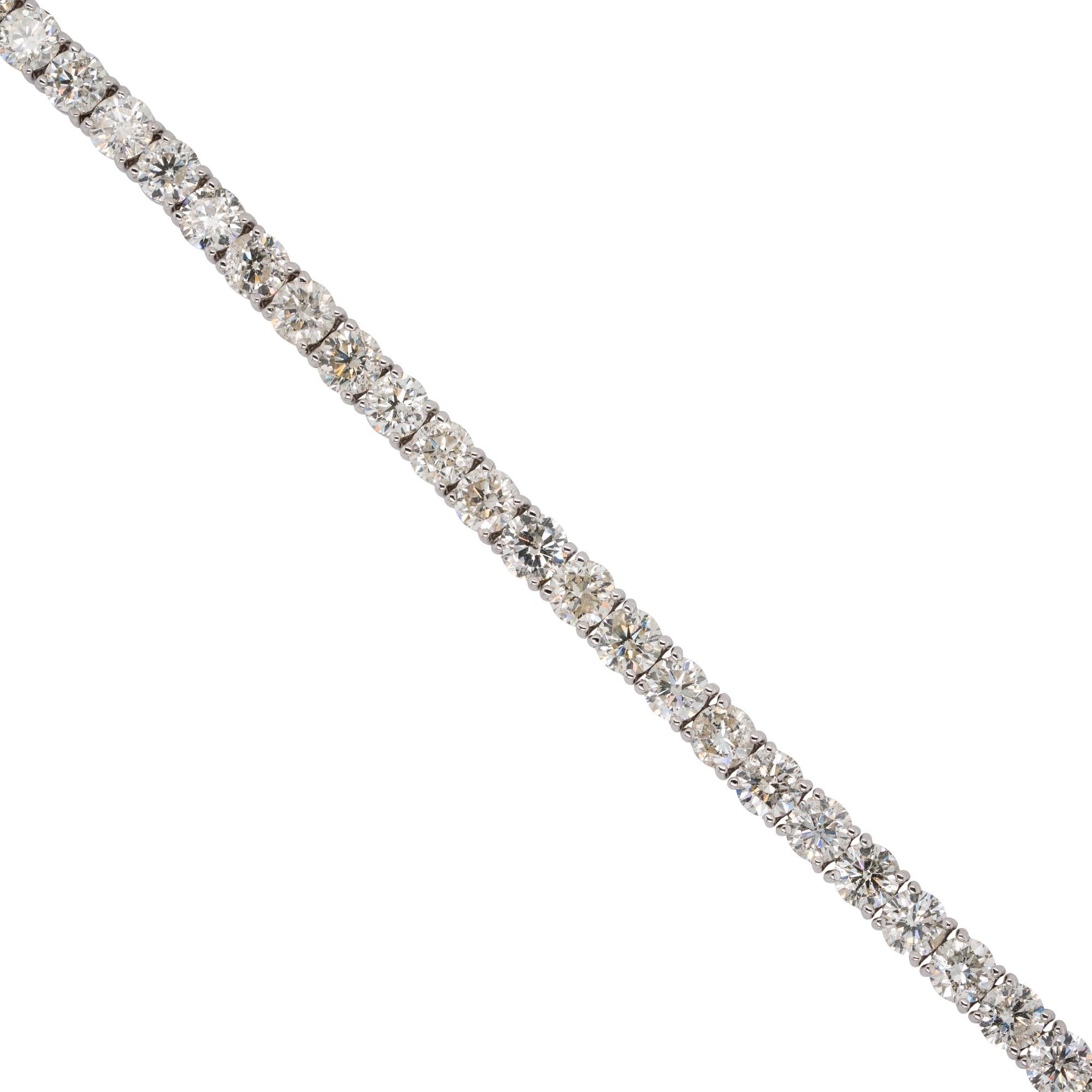 Material: 14k white gold
Diamond Details: Approx. 15.5ctw of round cut Diamonds. Diamonds are G/H in color and VS in clarity
Bracelet Measurements: 7 inches in length and 4.5mm  wide
Total Weight: 16g (10.3dwt)
Additional Details: This item comes