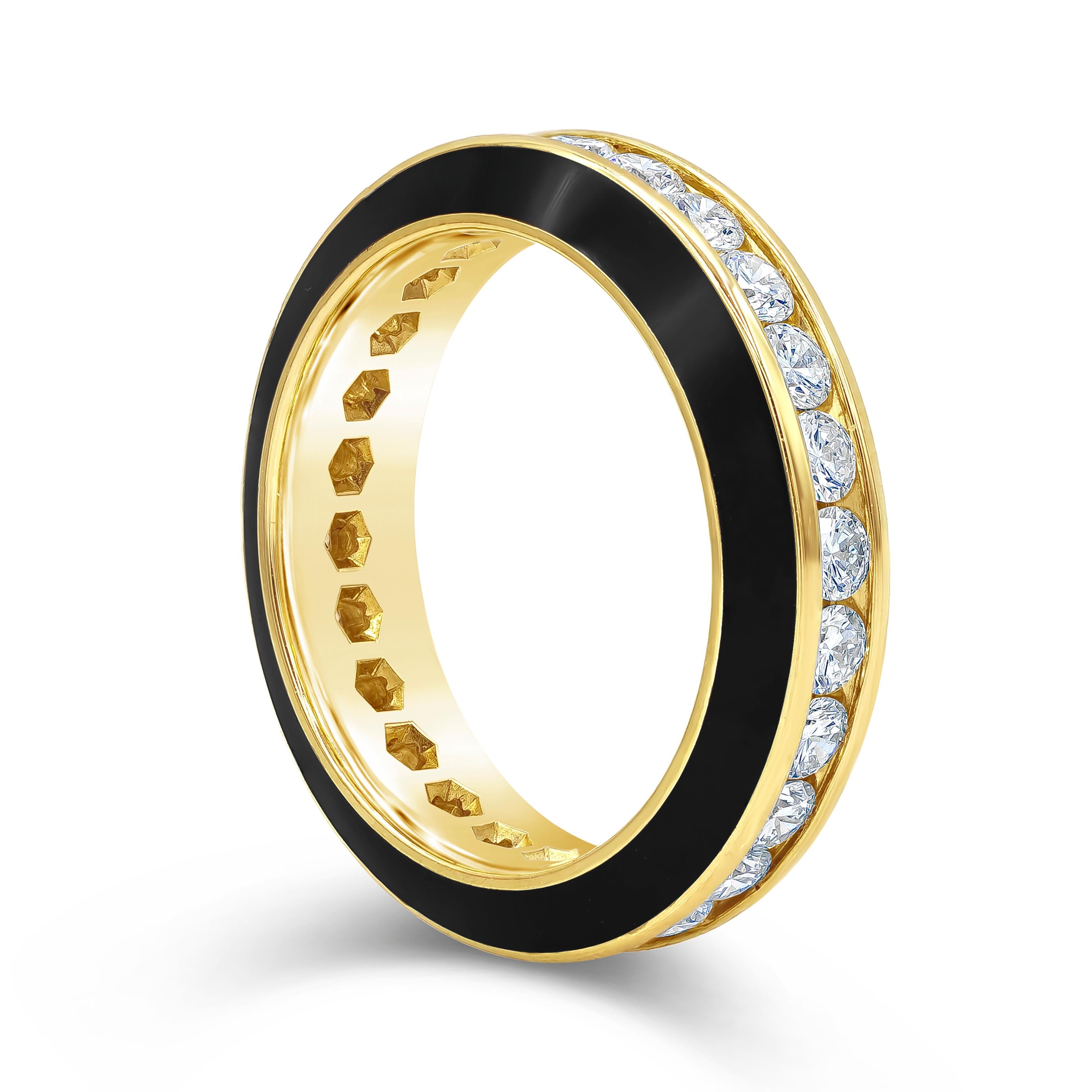 Showcasing a beautiful wedding band set with single row of round brilliant diamonds weighing 1.55 carats total, G Color and VS in Clarity. Channel set in-between two rows of black enamel, Finely made in 18K Yellow Gold. Size 6.5 US resizable upon