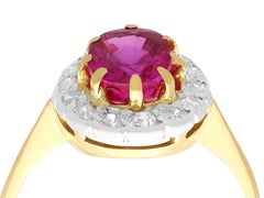 1.55 Carat Ruby and Diamond Yellow Gold Cluster Engagement Ring