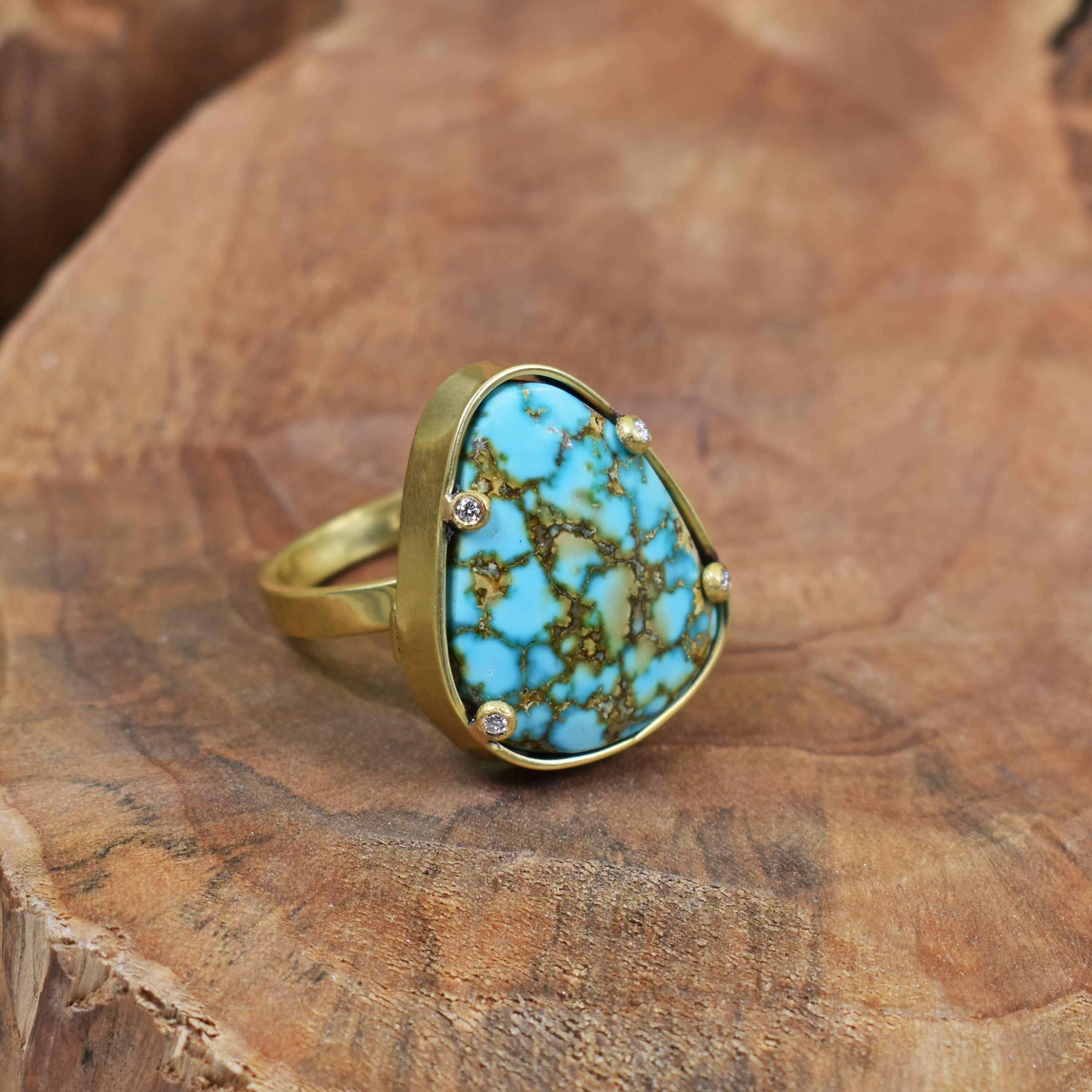 15.5 carat Turquoise Mountain (Arizona) Turquoise and accent white diamonds in a brushed, satin 18k yellow gold cocktail ring. Ring is size 6.25 and is resizable. Stunning Turquoise gemstone with golden matrix in a contemporary, artisan ring.