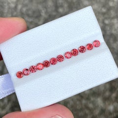 1.55 carats 12 Piece Calibrated Size Round Cut Peach Garnet Lot from Africa