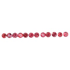 1.55 carats 12 Piece Calibrated Size Round Cut Peach Garnet Lot from Africa