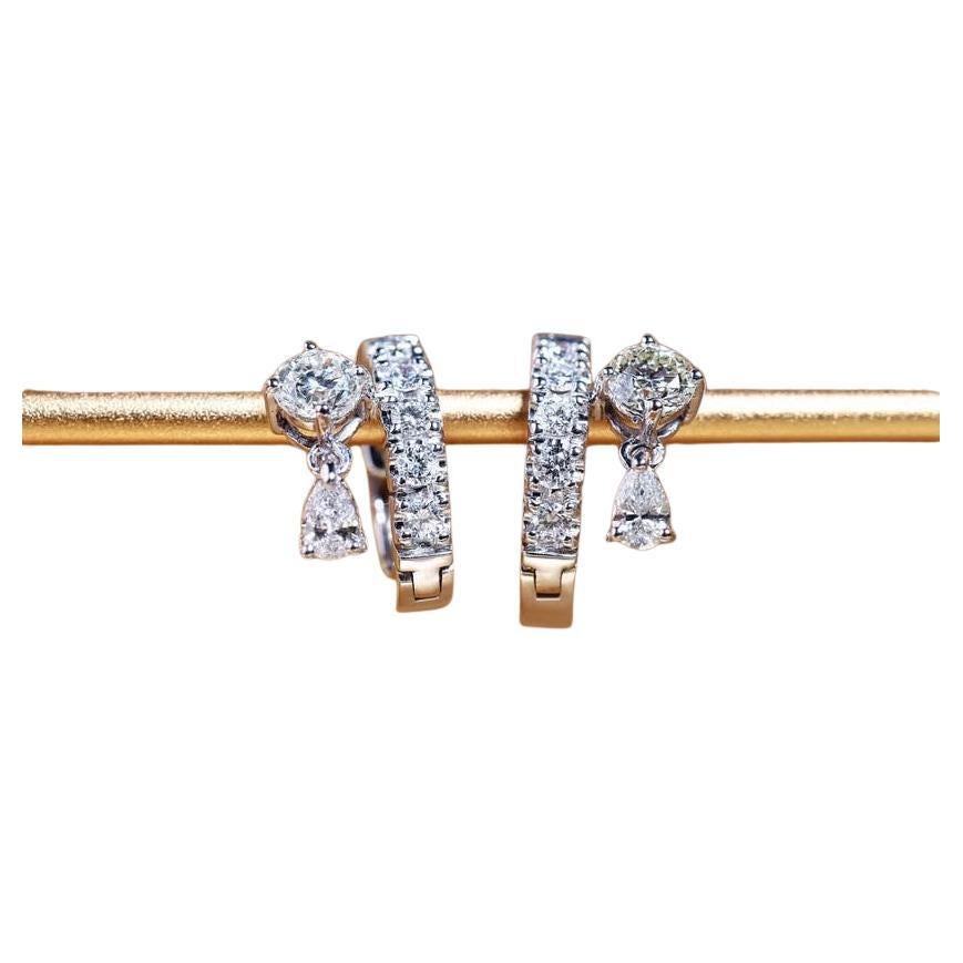 Un paio di squisiti orecchini con diamanti dal design moderno, dallo stile elegante e raffinato.
Gli splendidi orecchini sono realizzati in oro 18 carati con splendidi diamanti di 1,55 carati, G/VS.
Realizzato a mano da artigiani orafi.

Prezzo