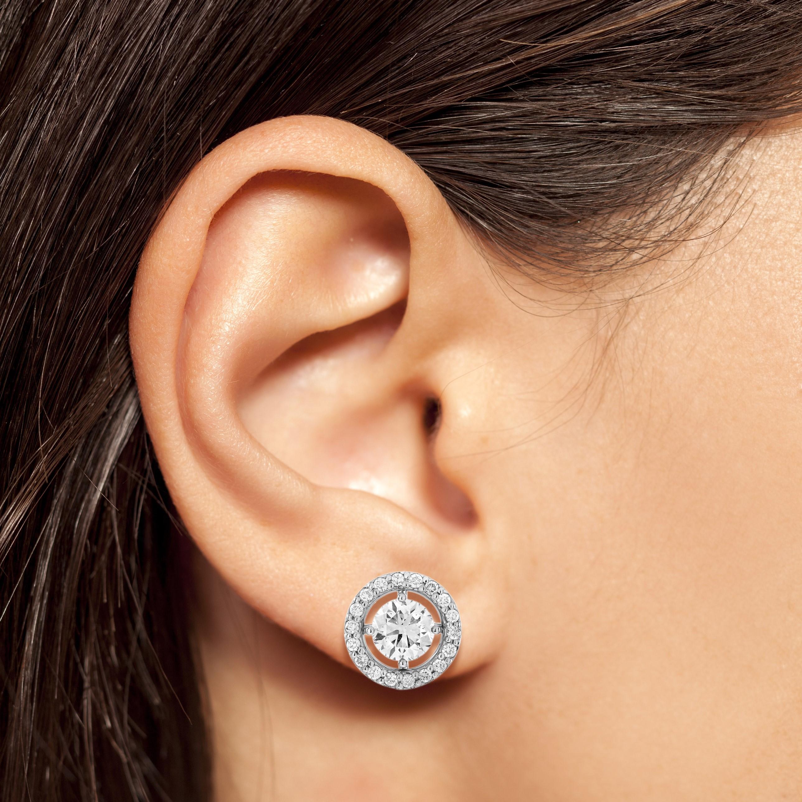 Indulge in timeless elegance with our exquisite diamond cluster stud earrings in 18k white gold, crafted specifically for those who appreciate both classic sophistication and modern brilliance. The stunning design features a brilliant 1.55-carat