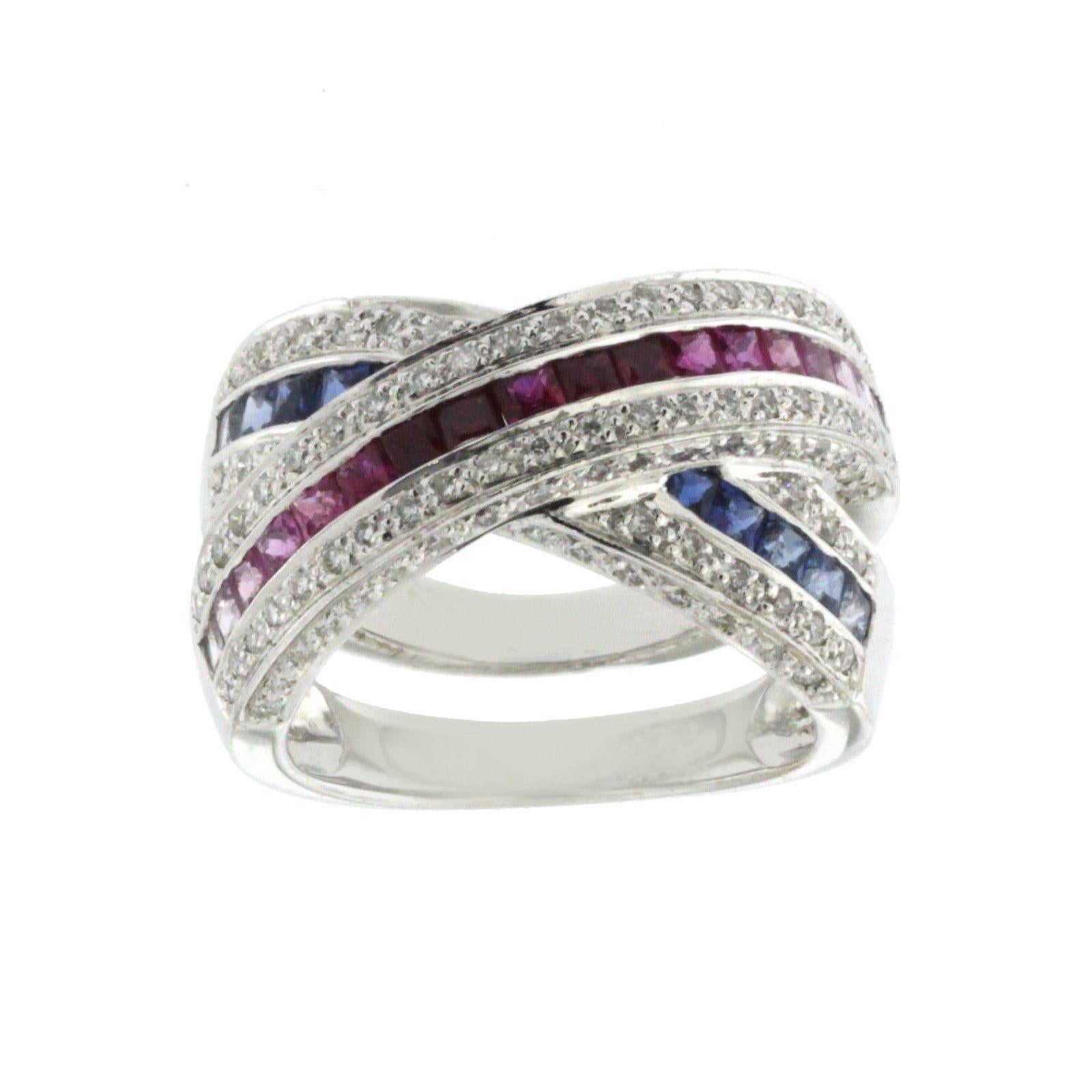 Top: 13 mm
Band Width: 8.5 mm
Metal: 18K White Gold 
Size: 6-8 ( Please message Us for your Size )
Hallmarks: 750
Total Weight: 14.2 Grams
Stone Type: 1.55 CT Natural Multi Sapphires & 0.55 G SI1 CT Diamonds
Condition: New
Estimated Retail Price: