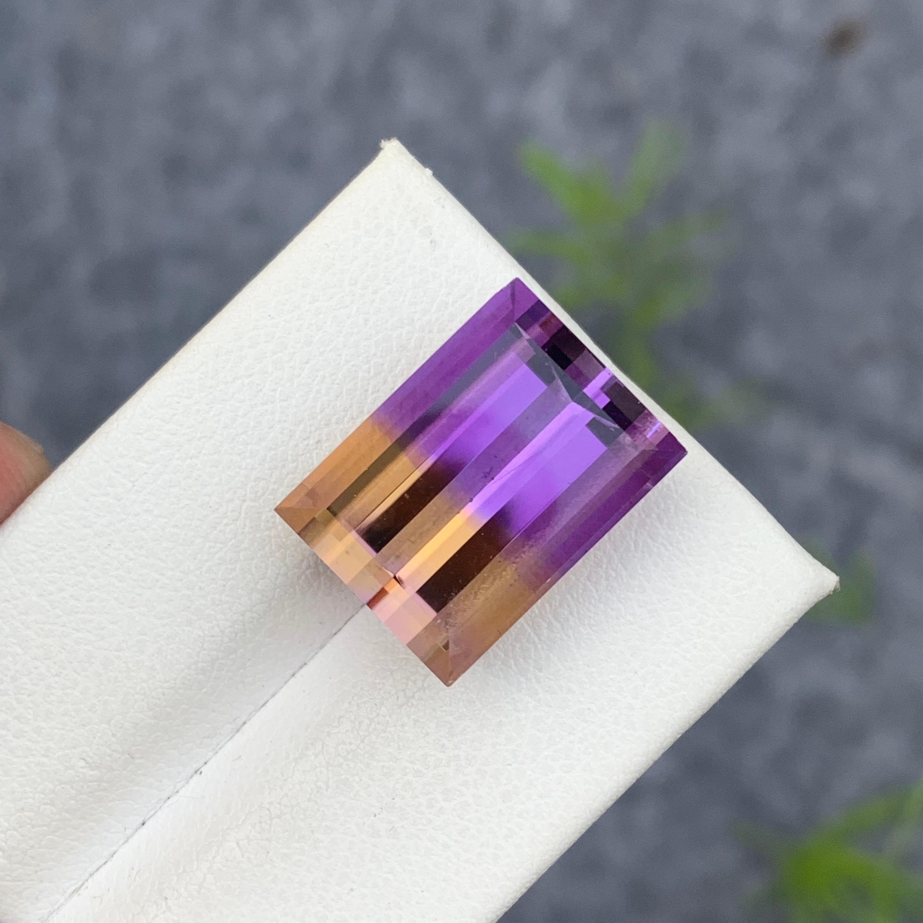 Faceted Ametrine 
Weight: 15.50 Carats
Dimension: 16.6x12.3x9.5 Mm
Origin: Bolivia
Shape: Baguette
Color: Purple & Yellow
Clarity: Eye Clean
Certificate: On Demand
For those born in the month of February, you've been graced with amethyst as your