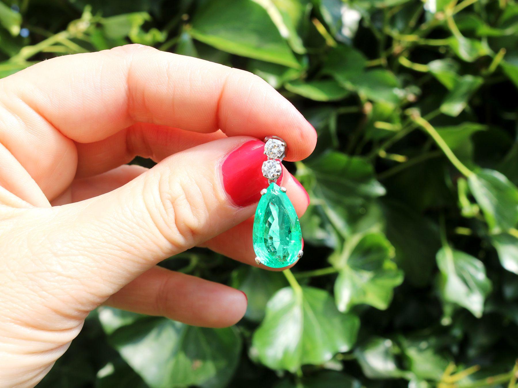 A stunning, fine and impressive pair of vintage 15.51 carat Colombian emerald and 1.12 carat diamond, platinum drop earrings; part of our diverse emerald jewellery collections

These stunning vintage emerald earrings have been crafted in