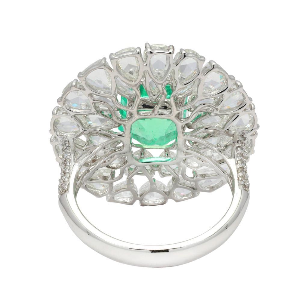 This stunning ring has been meticulously crafted from 14-karat gold. It is hand set in 4.69 carats Colombian Emerald and illuminated with 15.59 carats of rose cut diamonds. 

FOLLOW  MEGHNA JEWELS storefront to view the latest collection & exclusive