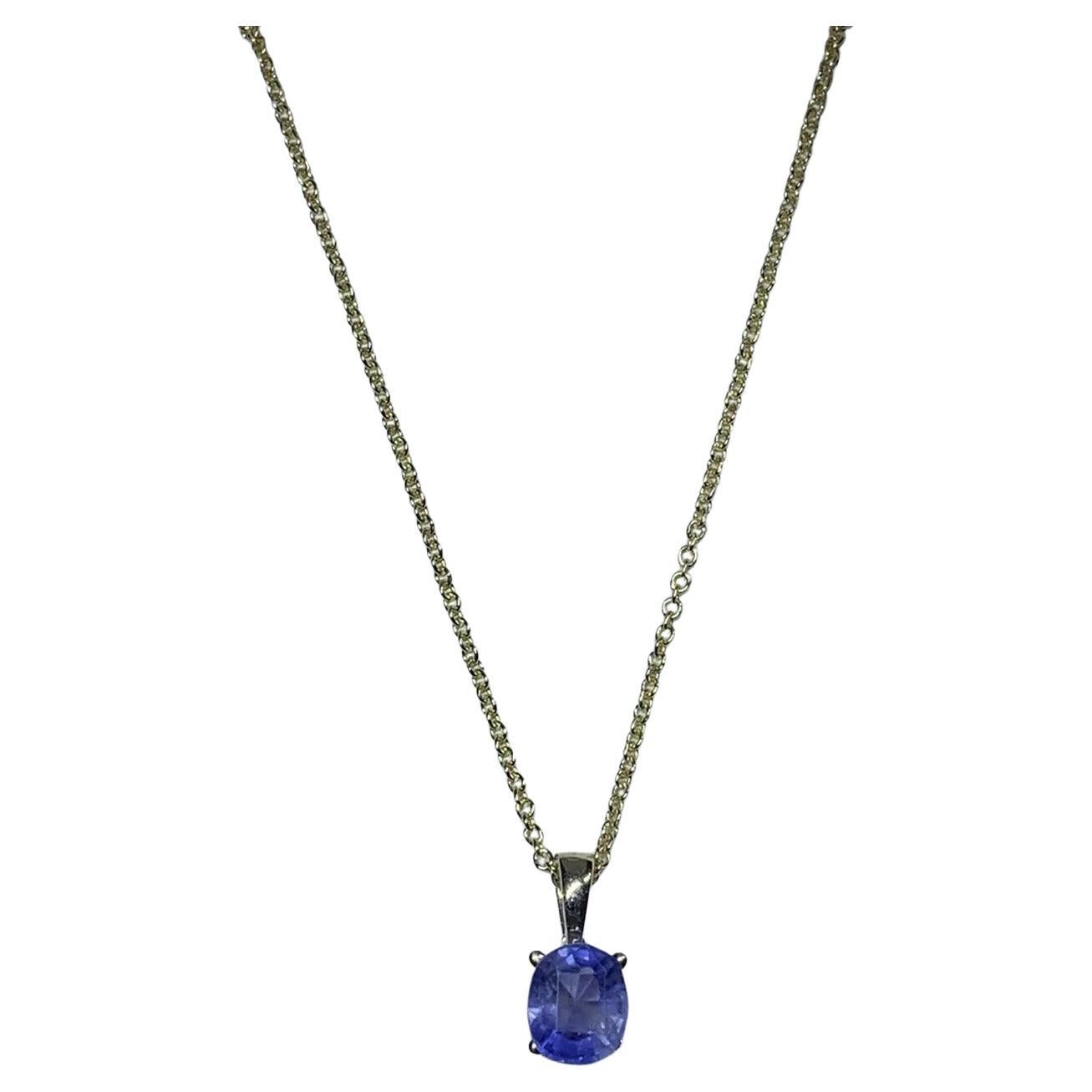 1.55ct Blue sapphire solitaire pendant necklace in 18k yellow gold.