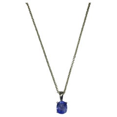 1.55ct Blue sapphire solitaire pendant necklace in 18k yellow gold.