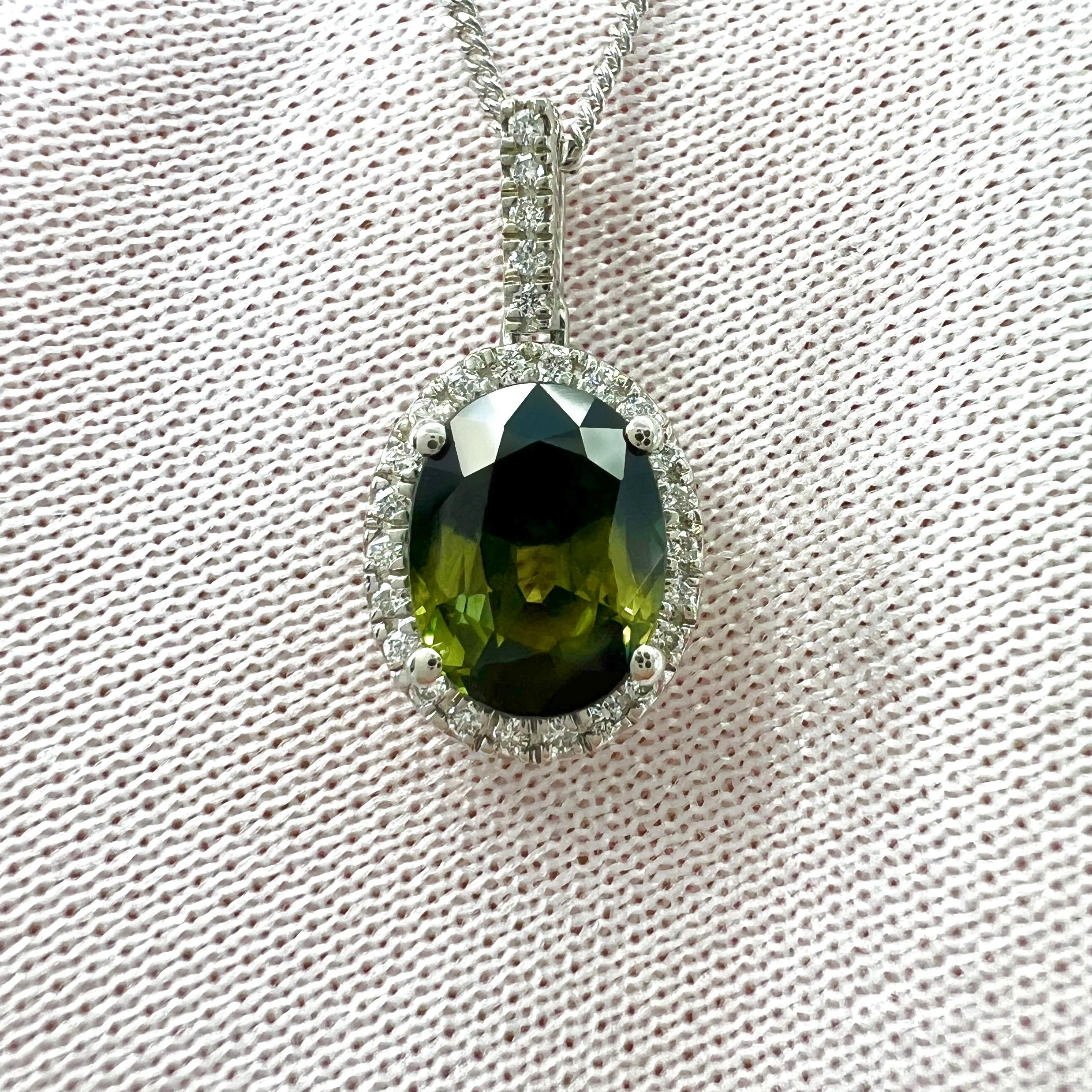 Unique Natural Green Yellow Blue Parti Colour Sapphire & Diamond 950 Platinum Halo Pendant Necklace.

1.55 Carat sapphire with a unique green yellow blue parti colour split. Rare and stunning to see.
This sapphire also has very good clarity. A clean