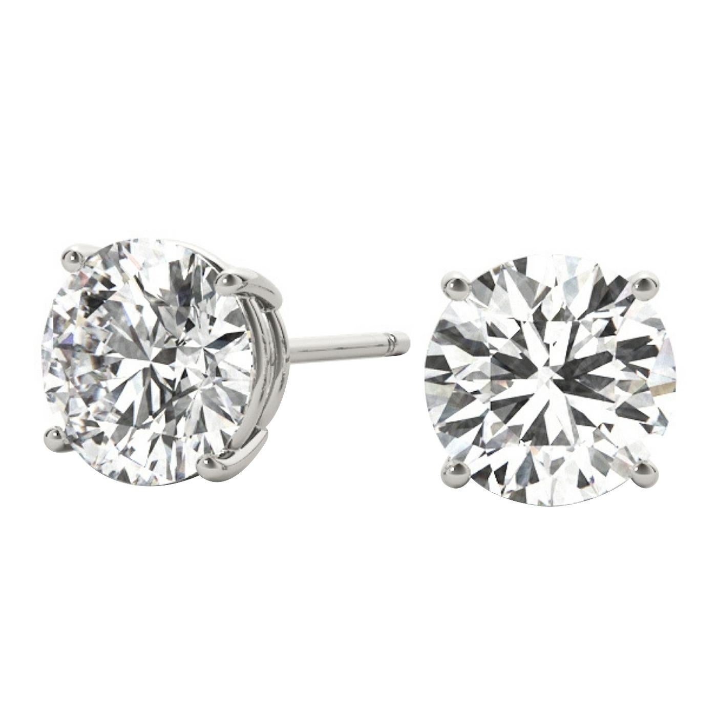 Beautiful, elegant, and classically stylish, these diamond stud earrings (totaling 1.55ct) are set with 4 prongs in a basket design. These beautiful sparkling diamond earrings display universal appeal. You and everyone else will see this for a long