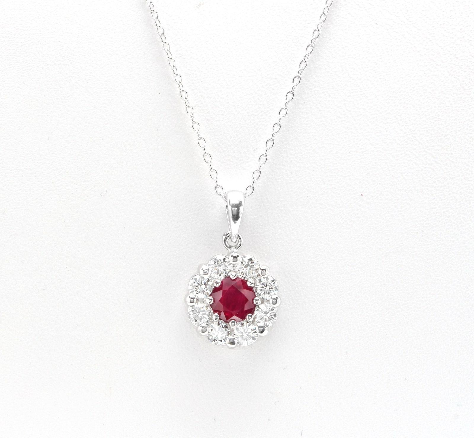1.55Ct Natural Red Ruby and Diamond 14K Solid White Gold Pendant Necklace

Amazing looking piece! 

Stamped: 14K

Suggested Replacement Value: 3,000.00 

Natural Round Cut Ruby Weights Approx. 0.70 Carats (Natural)

Ruby Measures: Approx.