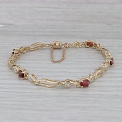 1.55ctw Garnet Diamond Tennis Bracelet 14k Yellow Gold 7" (oro amarillo)