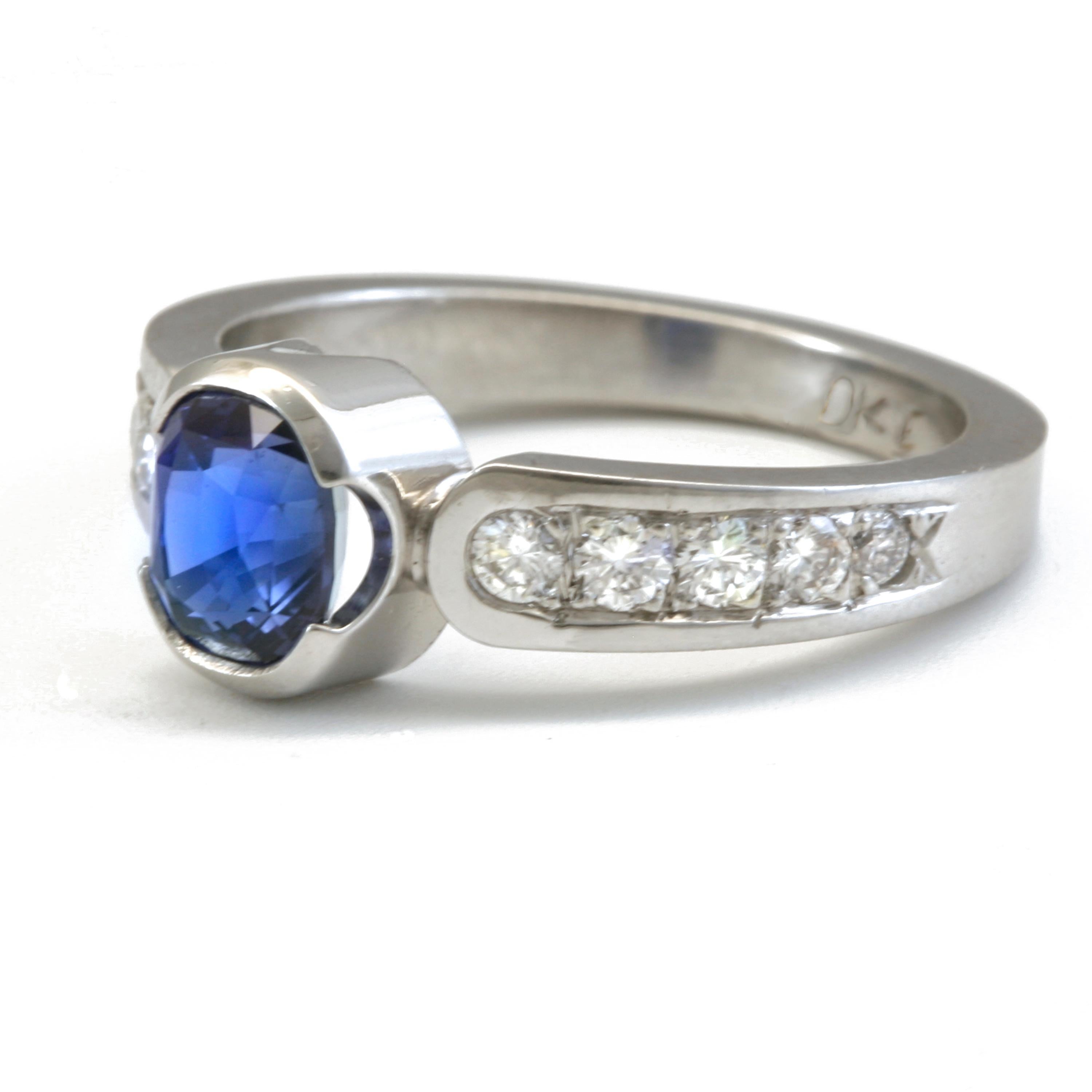 Artisan 1.56 Carat Blue Sapphire with .34 Carat Diamonds in Platinum For Sale