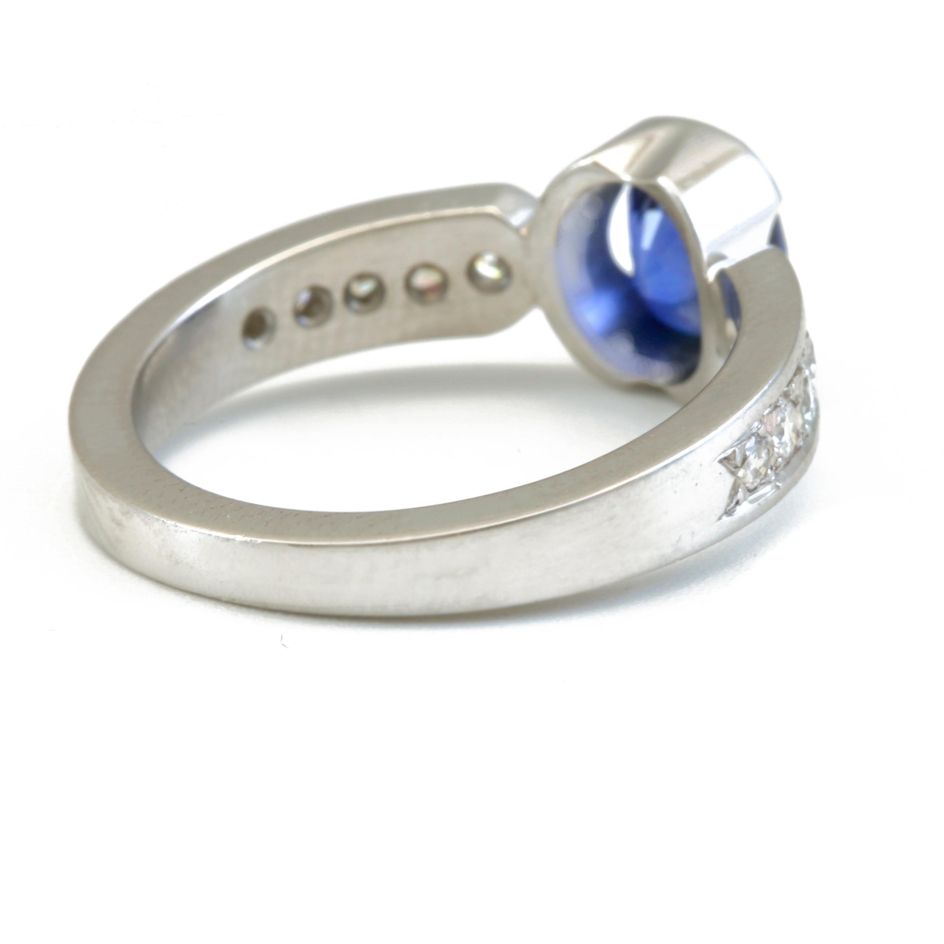 Women's or Men's 1.56 Carat Blue Sapphire with .34 Carat Diamonds in Platinum For Sale