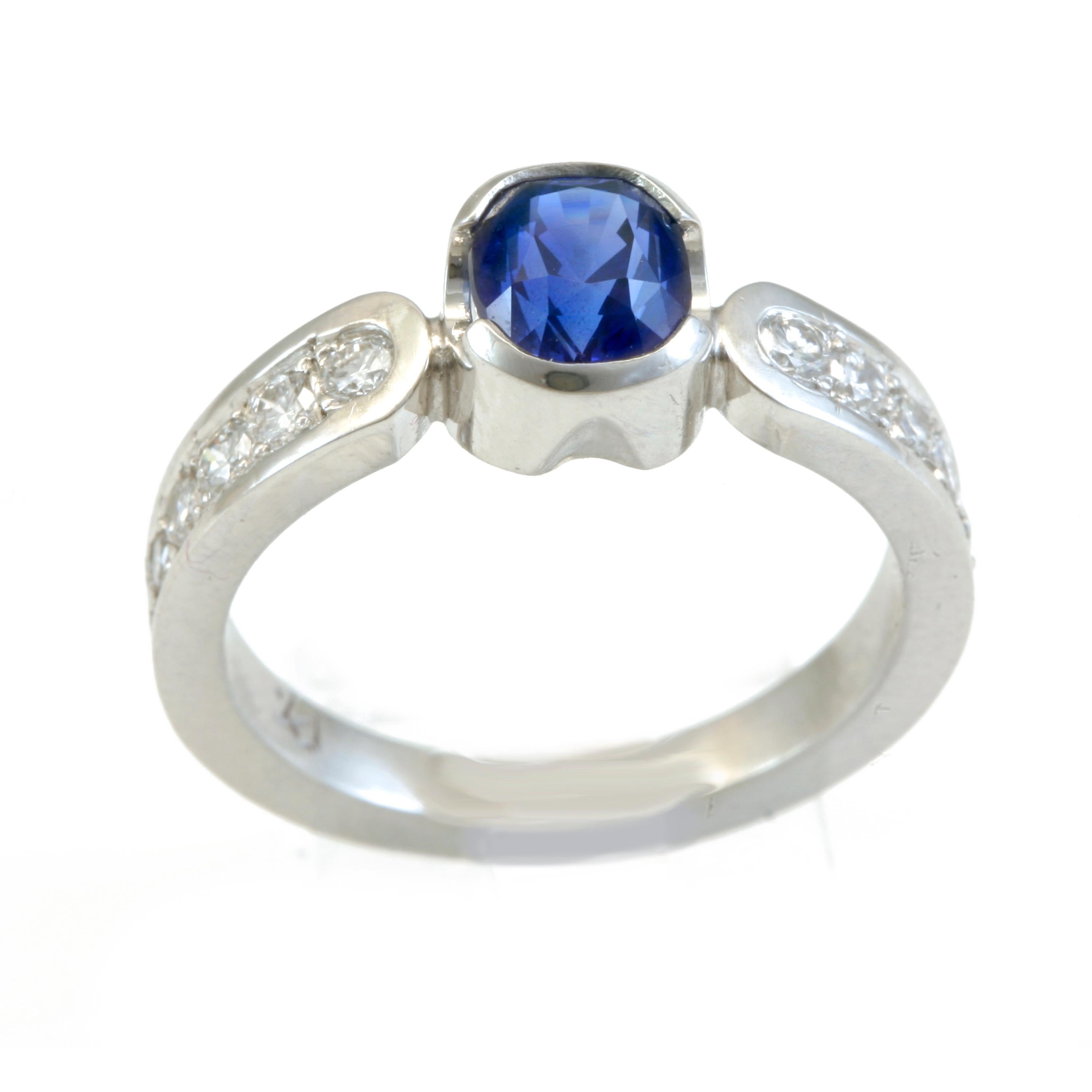 1.56 Carat Blue Sapphire with .34 Carat Diamonds in Platinum For Sale 1