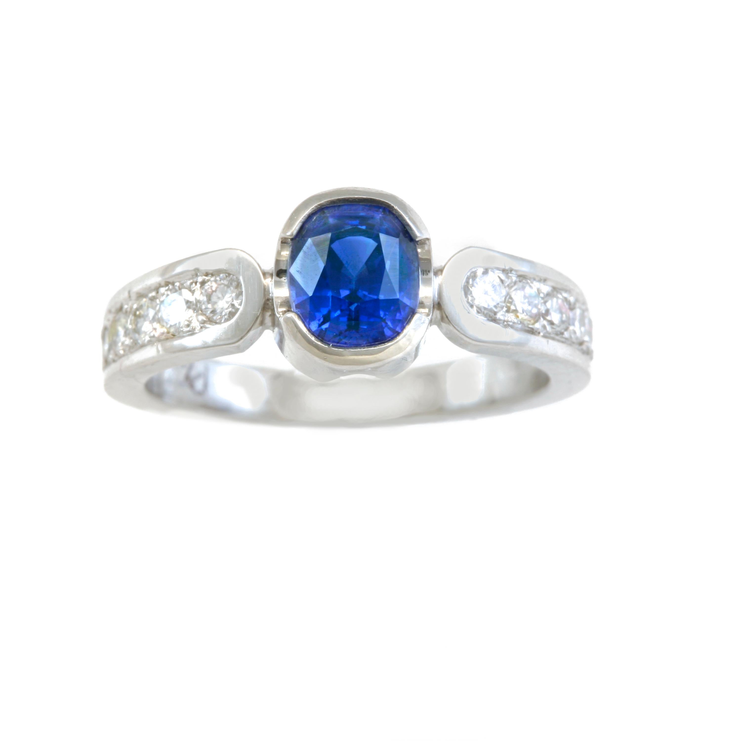 1.56 Carat Blue Sapphire with .34 Carat Diamonds in Platinum For Sale 2