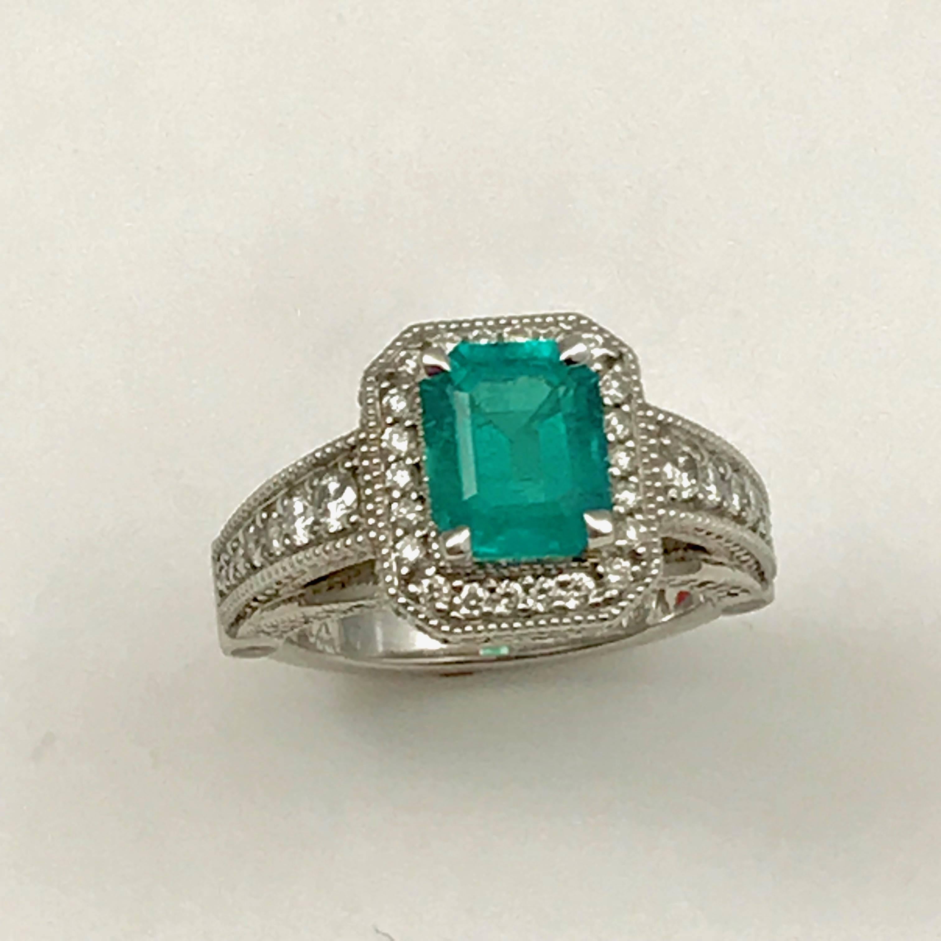 1.56 Carat Colombian Emerald Cocktail Ring Set in 14K White Gold.
This 1.56 Carat Colombian Emerald set in 14k white gold with 1.02 cts. of diamonds.

Ring will be sized free of charge, please state size when ordering.
Comes in a cherrywood box