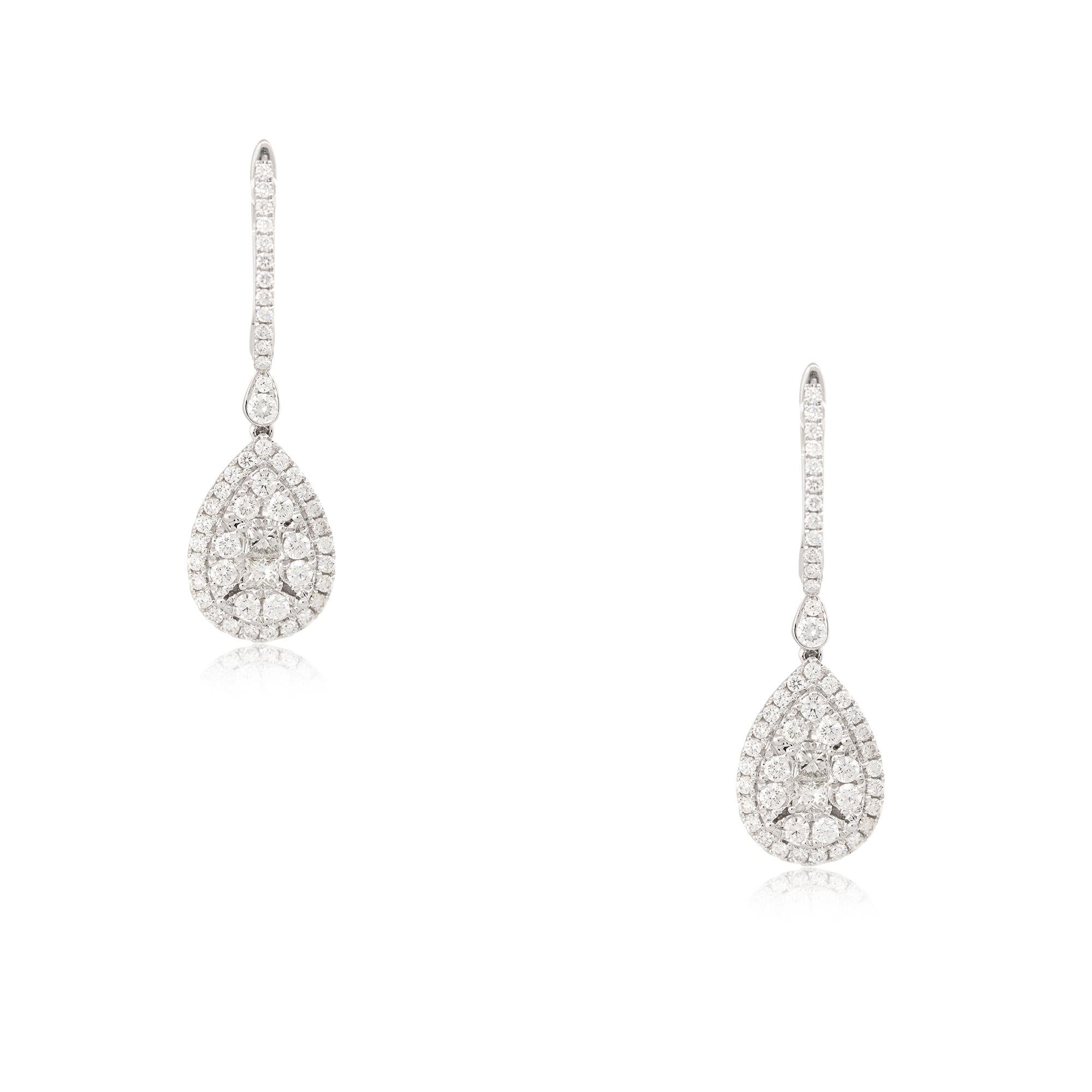 18 Karat White Gold 1.56 Carat Diamond Mosaic Tear Drop Earrings
Material: 18 Karat White Gold
Diamond Details: There are approximately 1.56 carats of Round Brilliant and Princess cut Diamonds. All diamonds are approximately G/H in color and