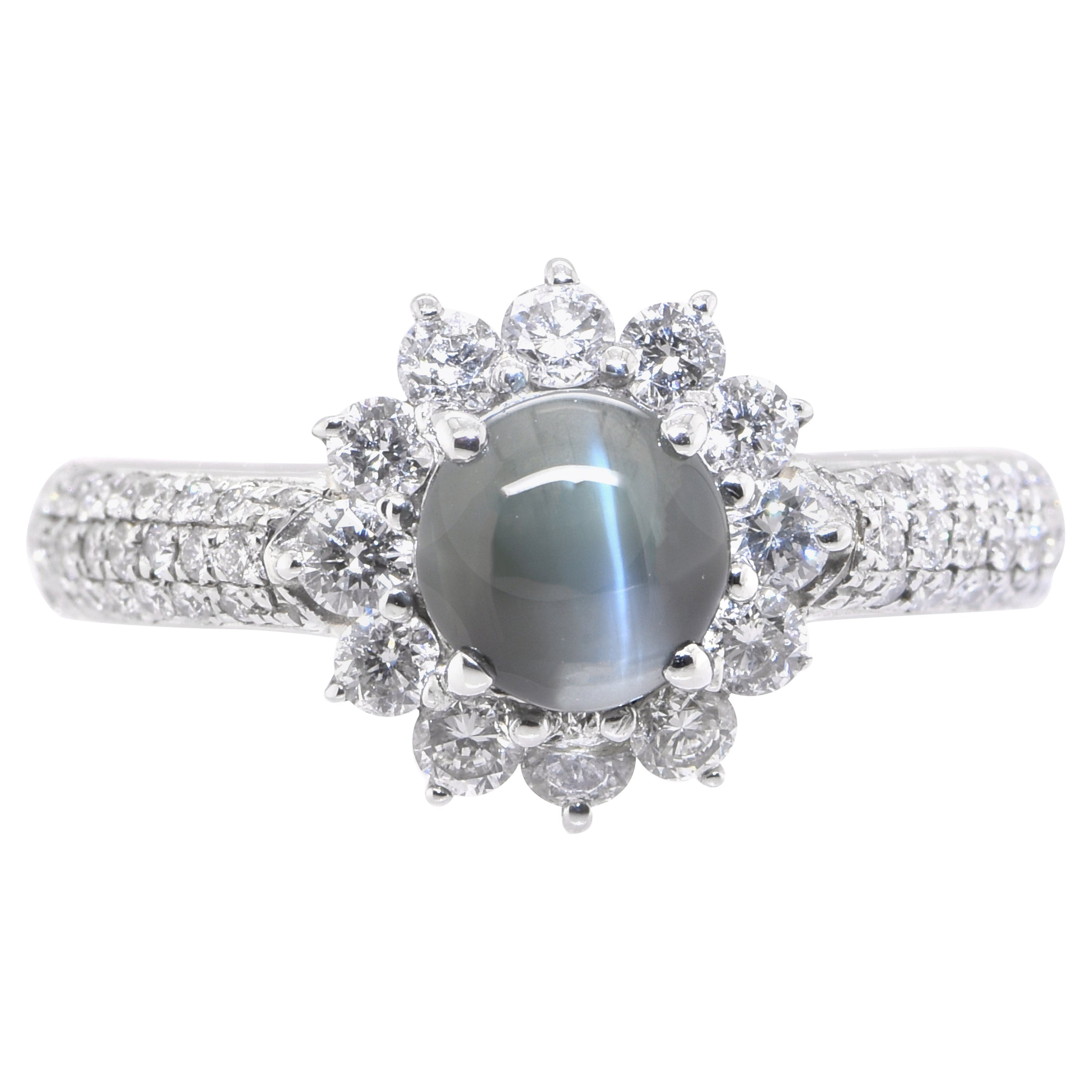 1.56 Carat Natural Alexandrite Cat
s Eye and Diamond Halo Ring Set in Platinum