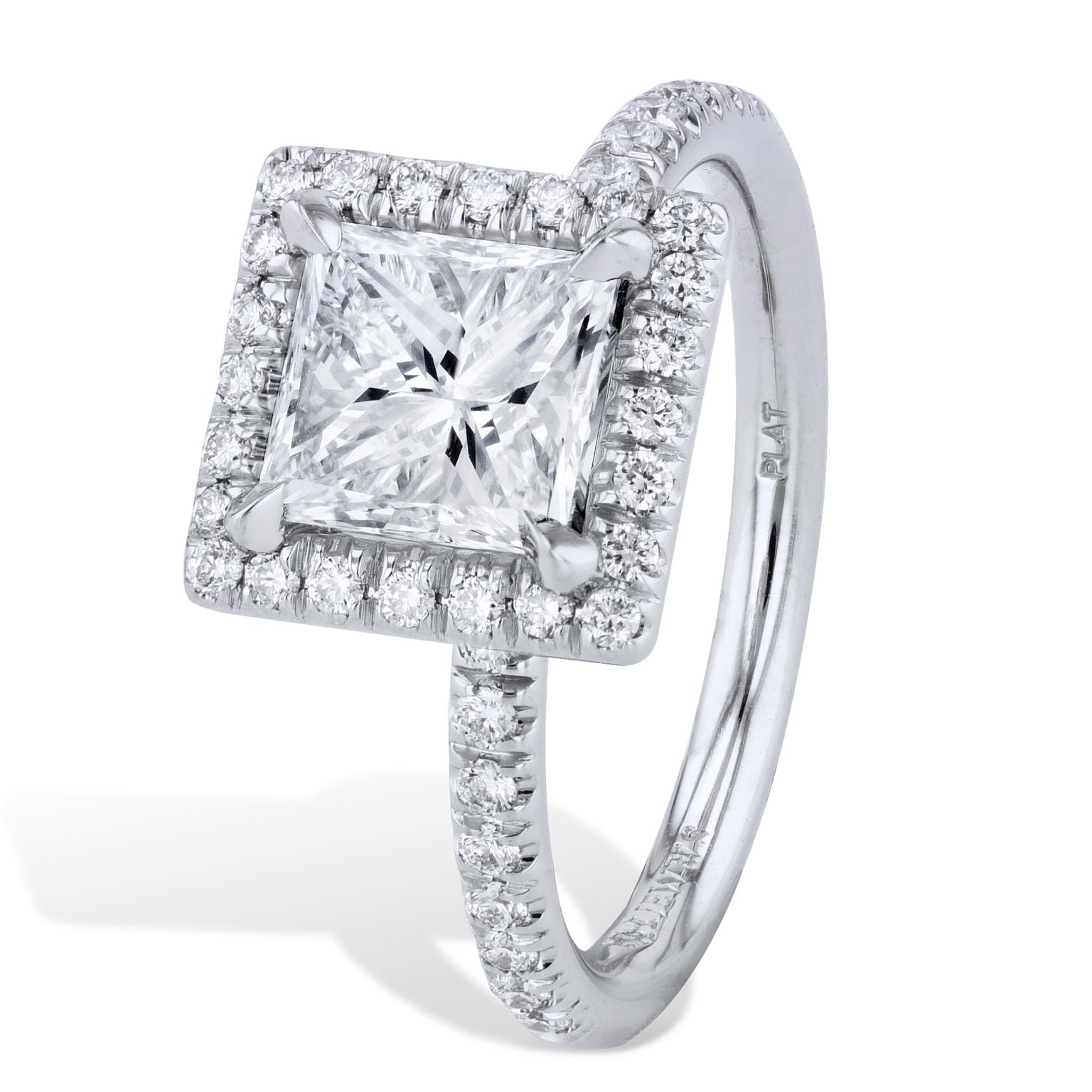 GIA Certified 1.56 Carat Princess Cut Diamond with a Pave Halo Engagement Ring

Feel like a princess wearing this 1.56 carat princess cut diamond ring (H – VVS2, VG VG), featuring a total weight of .32 carats of pave set diamonds in a beautiful halo