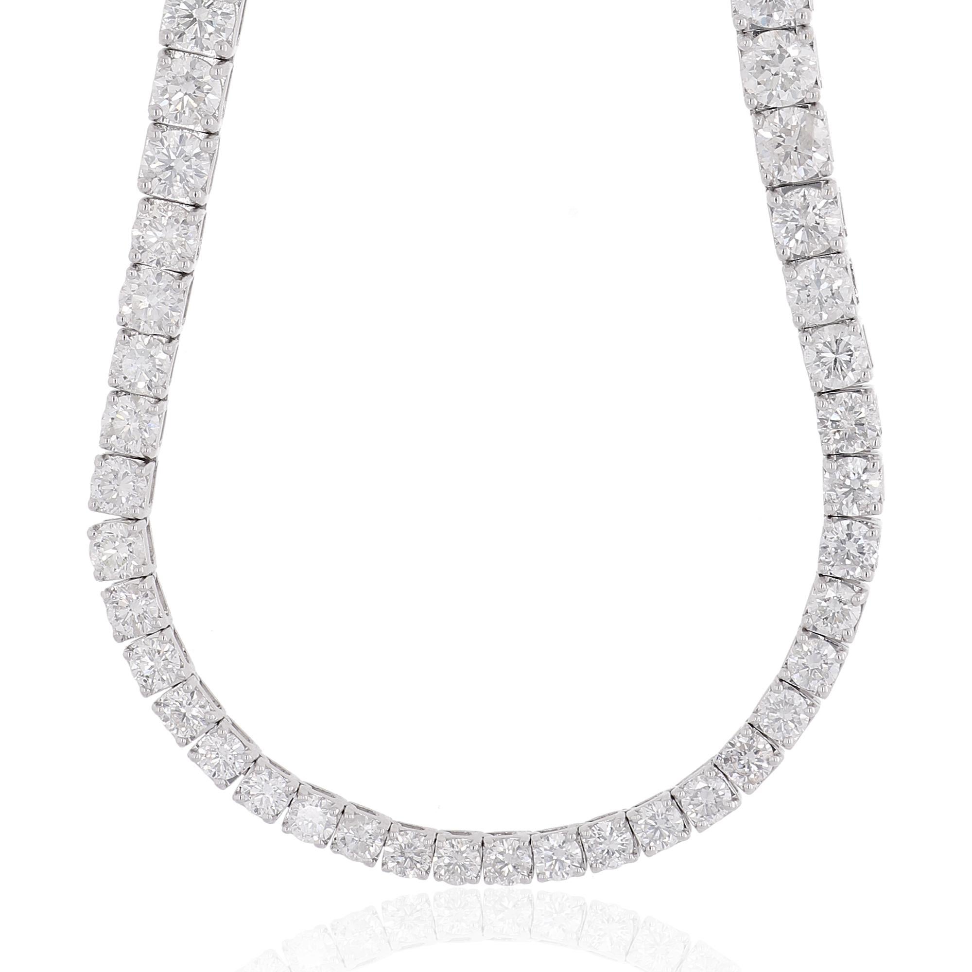 At the heart of this necklace lies a magnificent arrangement of round diamonds, totaling an impressive 15.6 carats. Each diamond is hand-selected for its exceptional clarity, graded at SI, ensuring that they possess remarkable transparency and