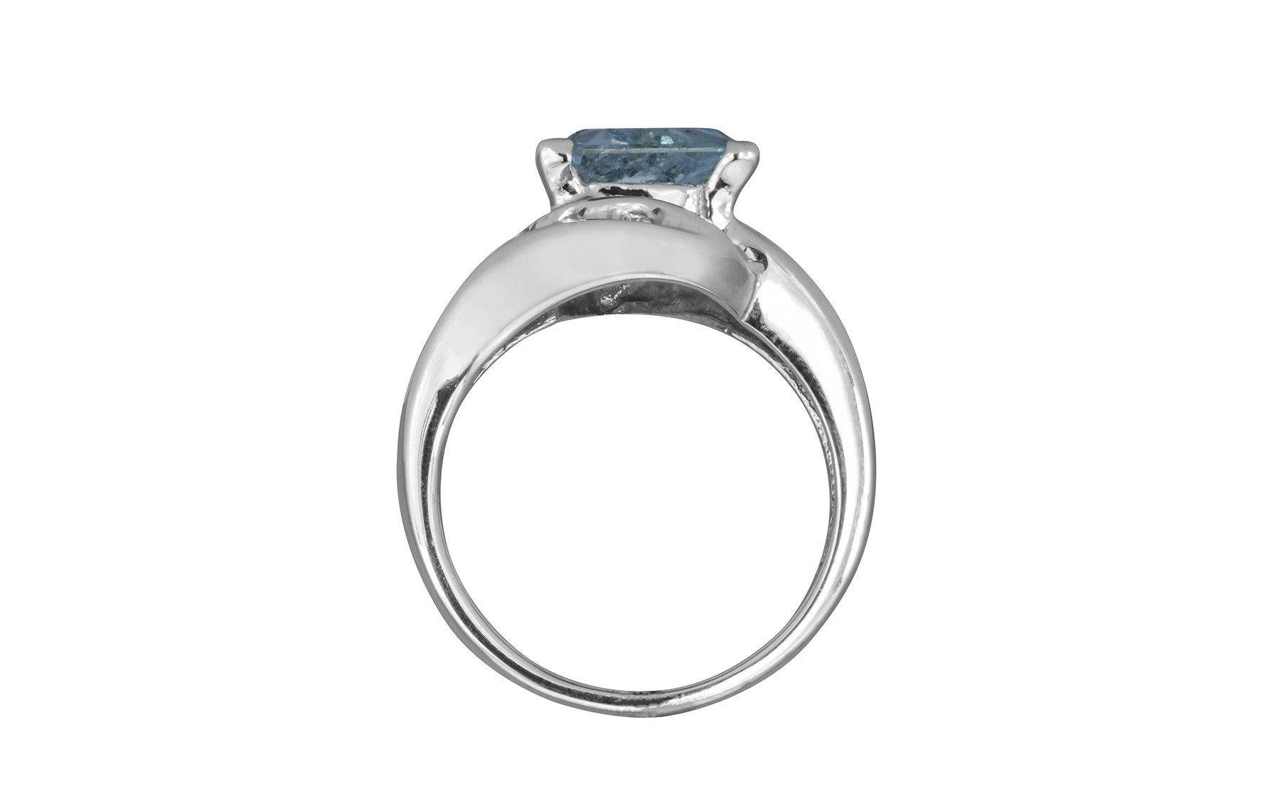 14 Karat White Gold Ring Featuring One 1.56 Carat Triangle Shaped Aquamarine And 5 Round Diamonds Totaling 0.05 Carat. Finger Size 7; Purchase Includes Sizing.