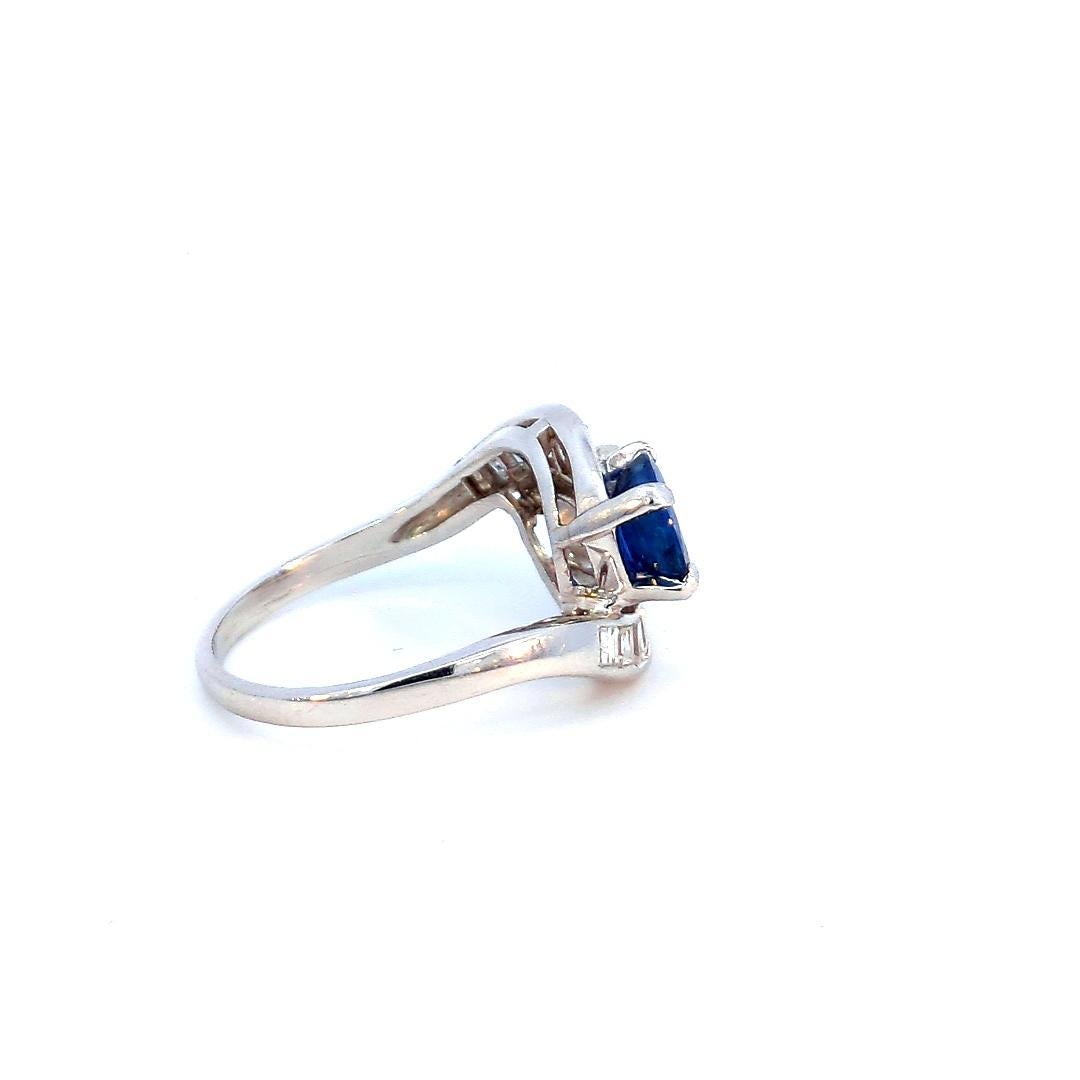Brilliant Cut 1.56 Carats Blue Sapphire And 1.30 Carats Diamond 2 Stone Ring For Sale